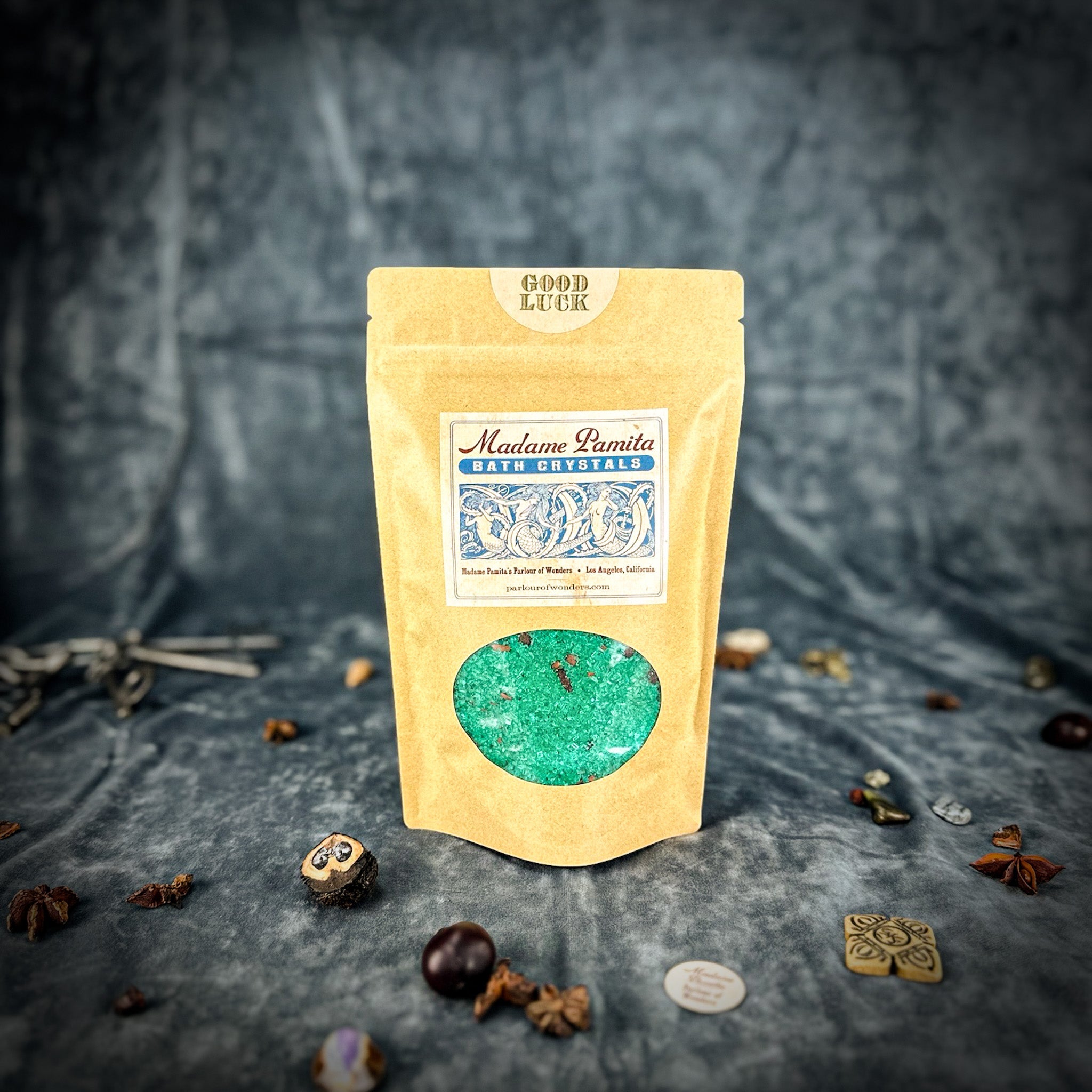 Parlour of Wonders Good Luck Bath Crystals in a clear glass jar with colorful crystals for relaxing bath aromatherapy.