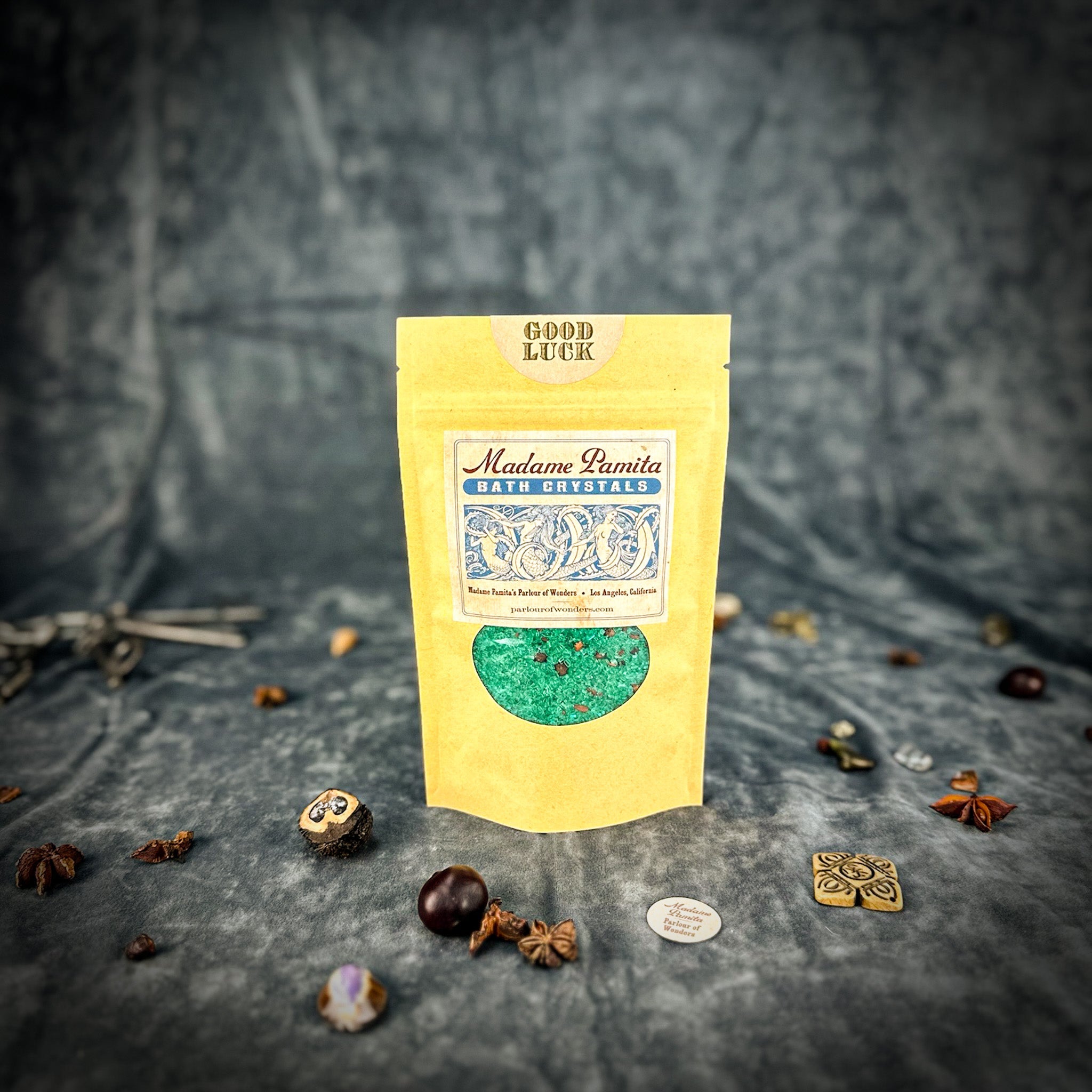 Small jar of Parlour of Wonders Good Luck Bath Crystals with colorful crystals and a calming, relaxing bath experience.