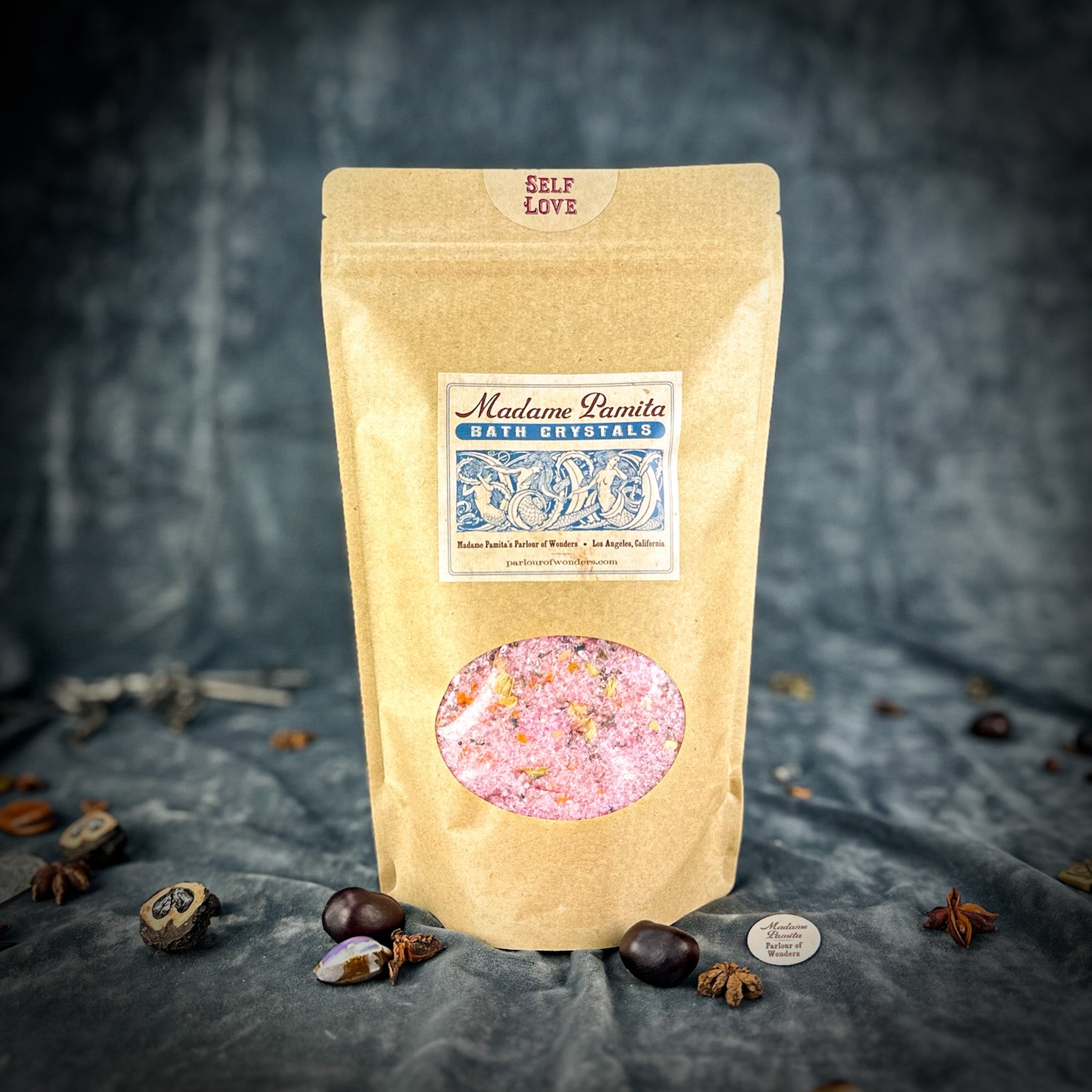 Self Love Bath Crystals by Parlour of Wonders in a clear glass jar with pink and purple bath crystals for relaxing self-care.