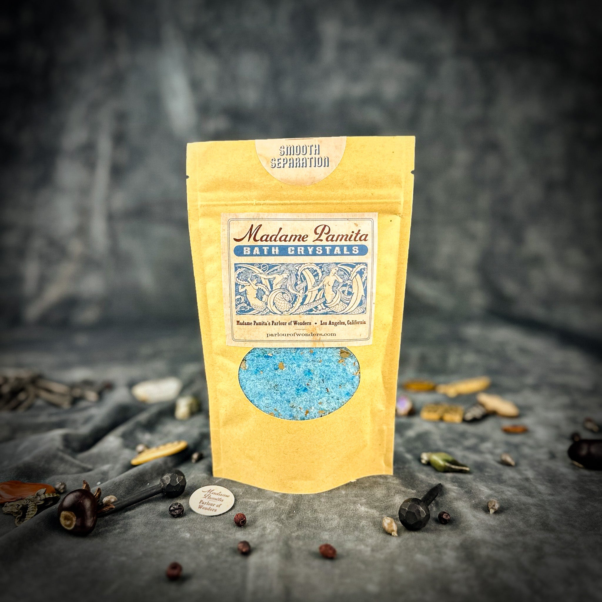 Small jar of Parlour of Wonders Smooth Separation Bath Crystals with colorful, fragrant crystals for relaxing bath experience.