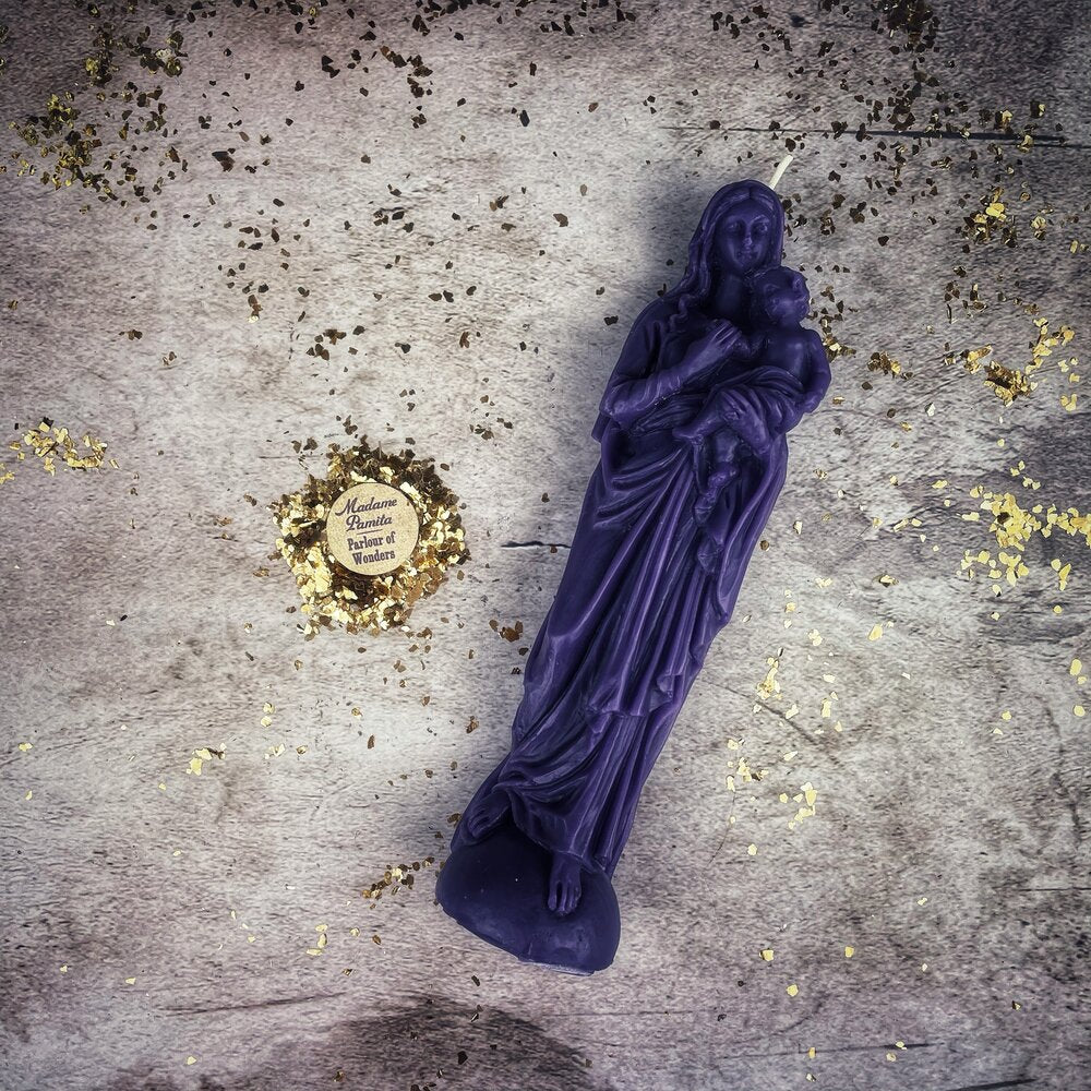 Blue beeswax Mother Mary spell candle by Parlour of Wonders for divine protection and unconditional love magic.