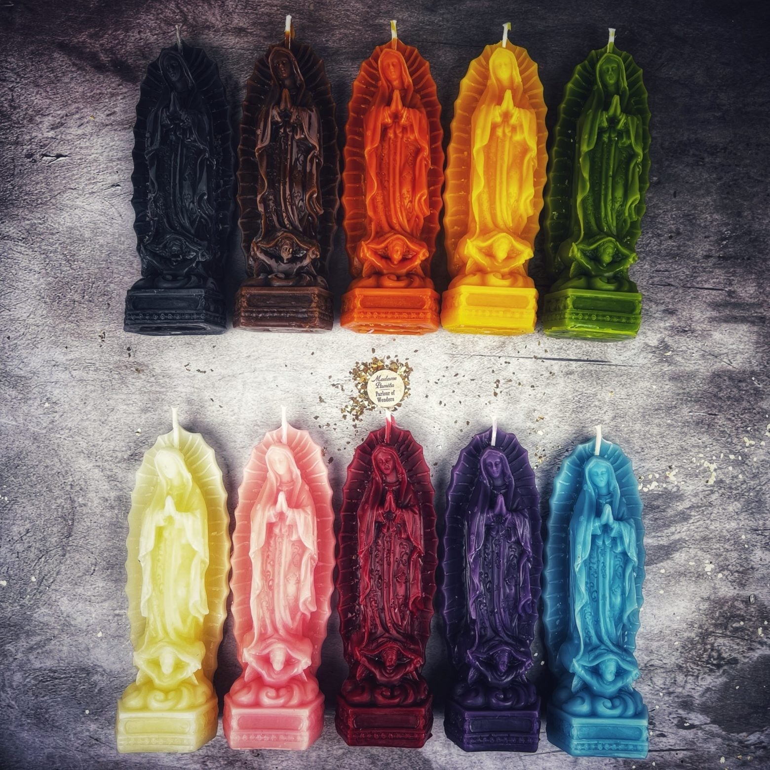 Blue beeswax candle featuring Nuestra Señora de Guadalupe, used for divine blessings, healing, and miracles.