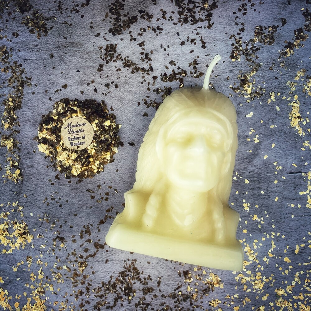 Beeswax Black Hawk Spell Candle by Parlour of Wonders, featuring a brown beeswax candle with spirit guide and social justice magic symbols.