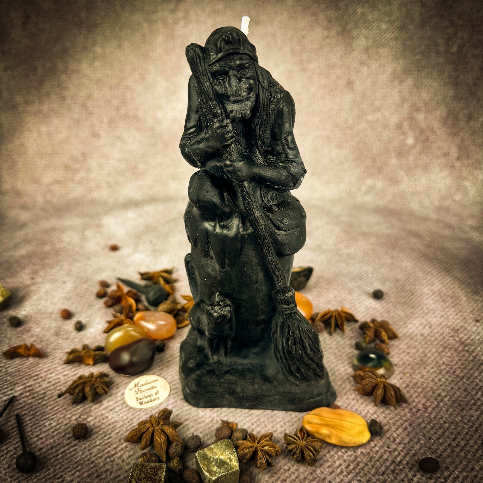 Beeswax Baba Yaga spell candle from Parlour of Wonders, brown grounding beeswax candle for wisdom, protection, and wild power.