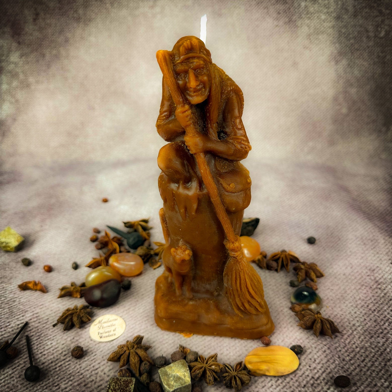 Beeswax Baba Yaga spell candle by Parlour of Wonders, grounded brown wax for wisdom, protection, and wild power.