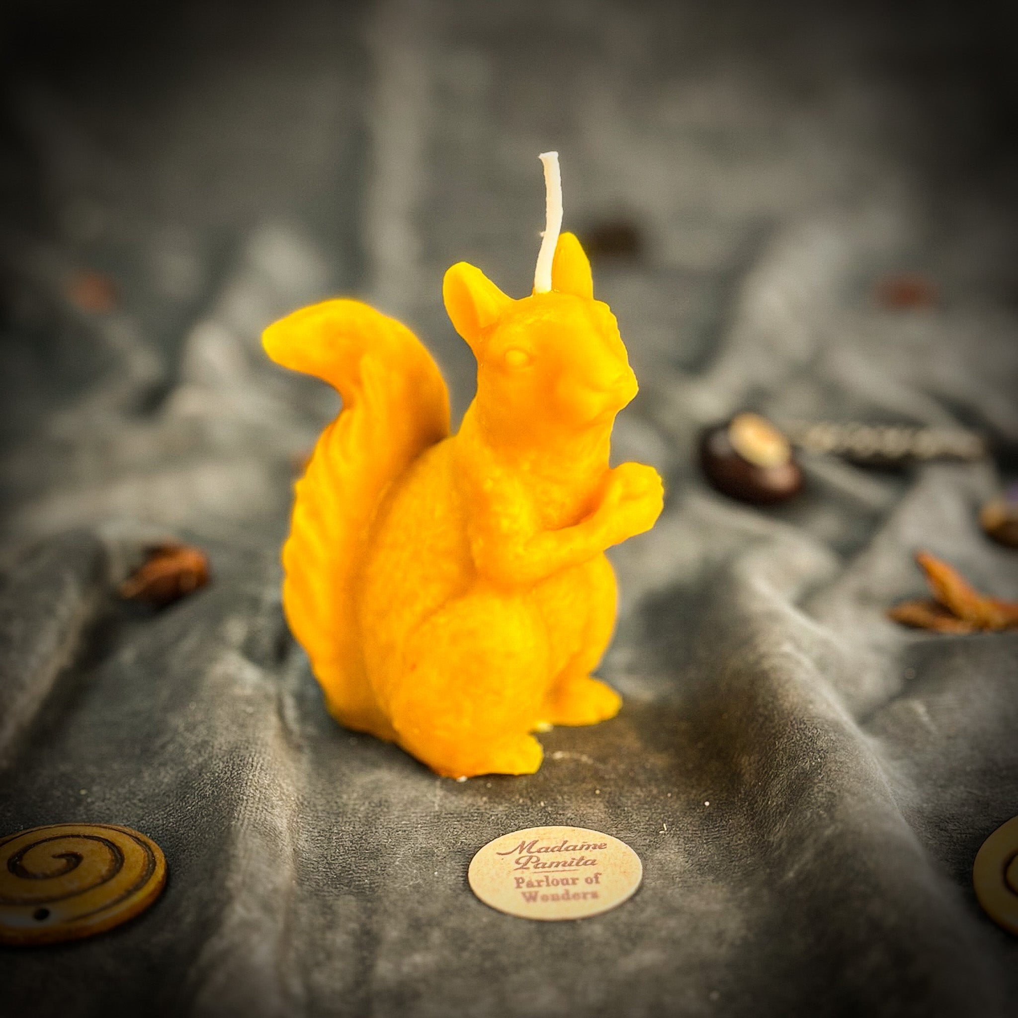 Beeswax Squirrel of Abundance spell candle by Parlour of Wonders, featuring a brown squirrel design for prosperity and grounding.