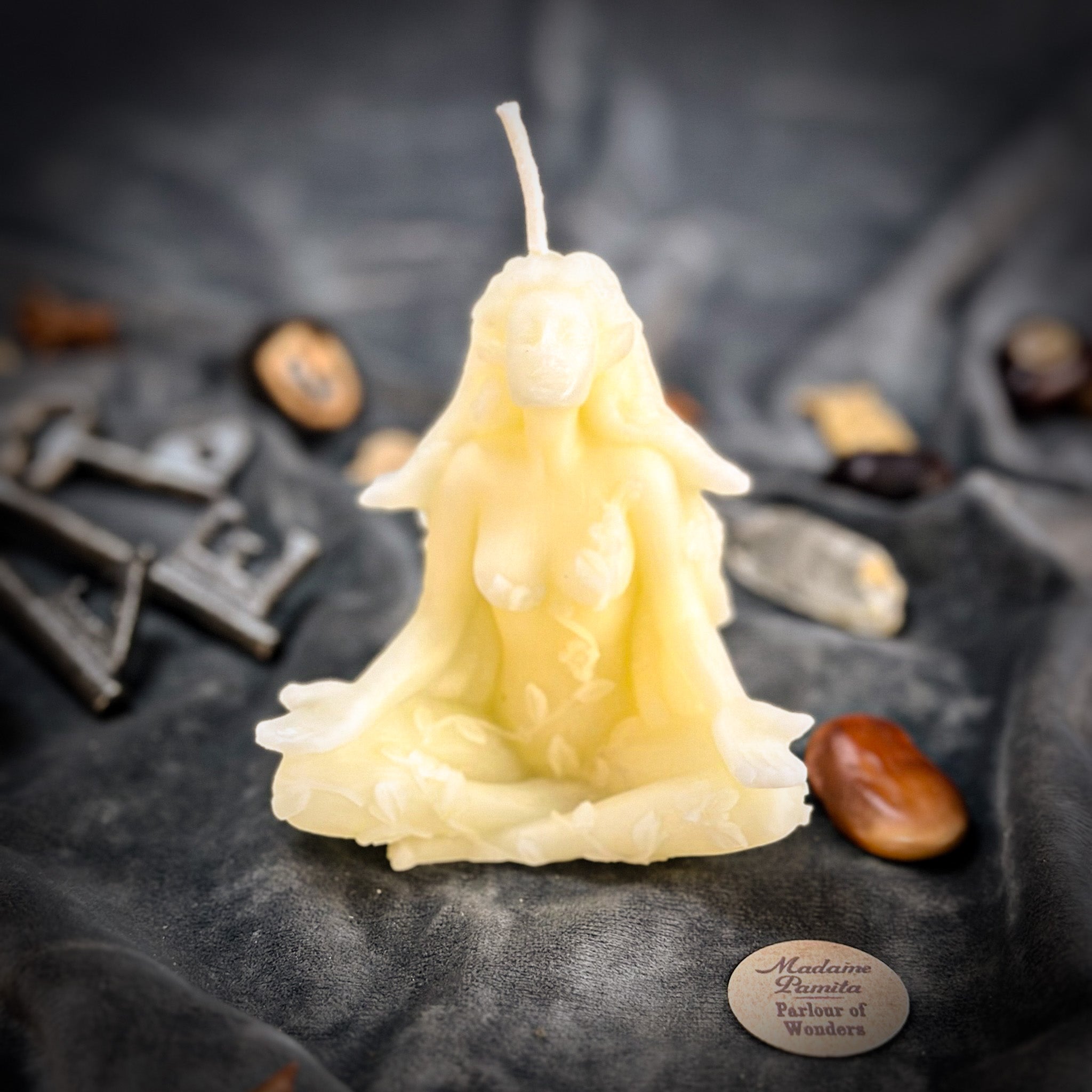 Green beeswax forest fairy spell candle by Parlour of Wonders, featuring nature spirits, peace, and enchanting forest motifs.
