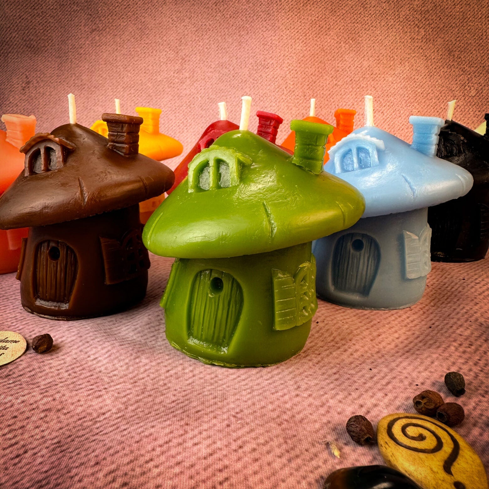 Green beeswax mushroom fairy hut candle by Parlour of Wonders, featuring detailed fairy home design for cozy magic ambiance.