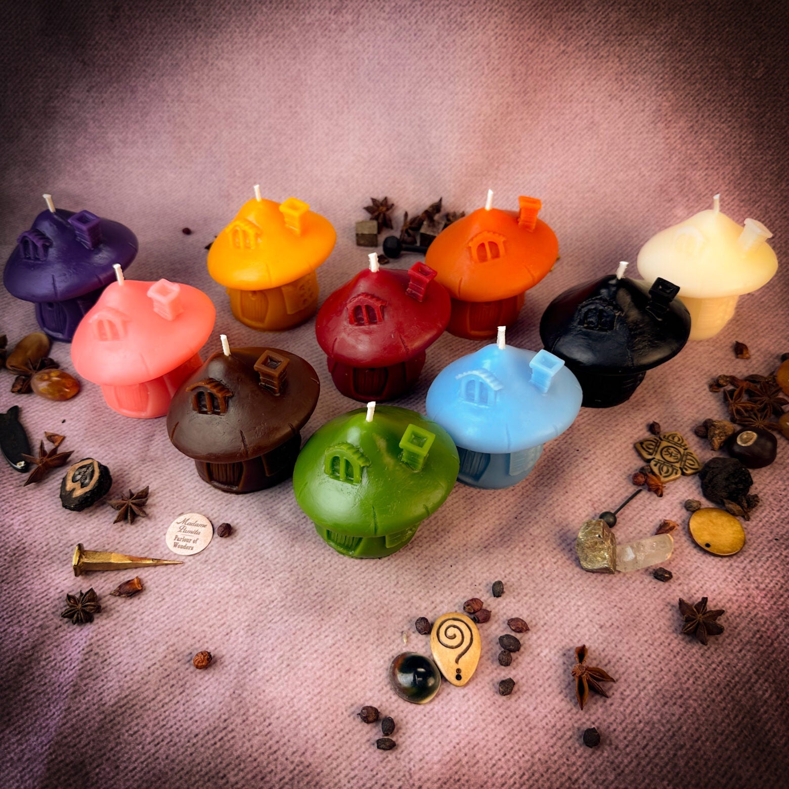 Green beeswax mushroom fairy hut candle by Parlour of Wonders, cozy home and magical sanctuary with intricate mushroom design.
