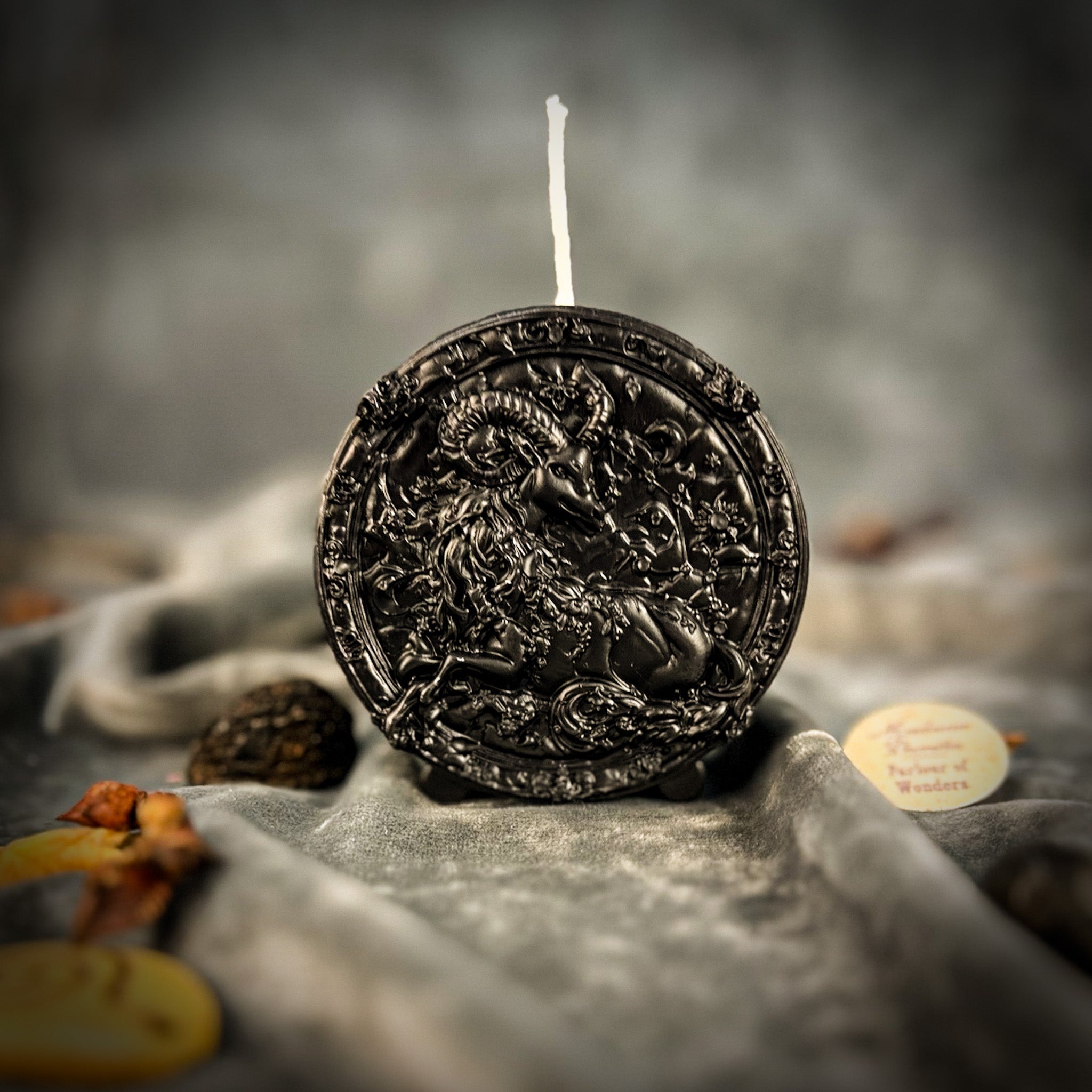 Green beeswax Capricorn zodiac spell candle by Parlour of Wonders featuring a goat design for ambition, discipline, and success.
