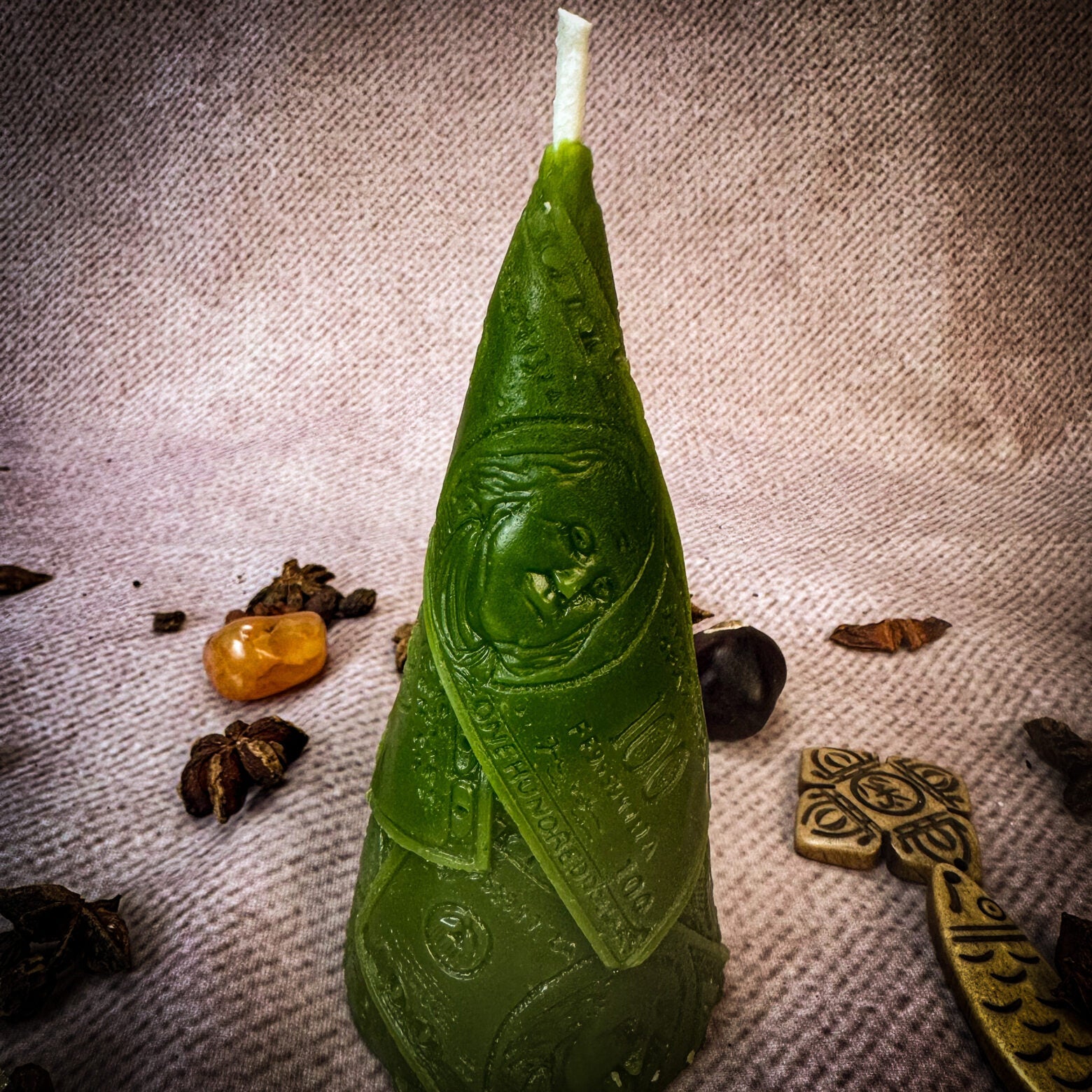 Green beeswax candle by Parlour of Wonders for prosperity and abundance magic, featuring a sleek, natural beeswax design.