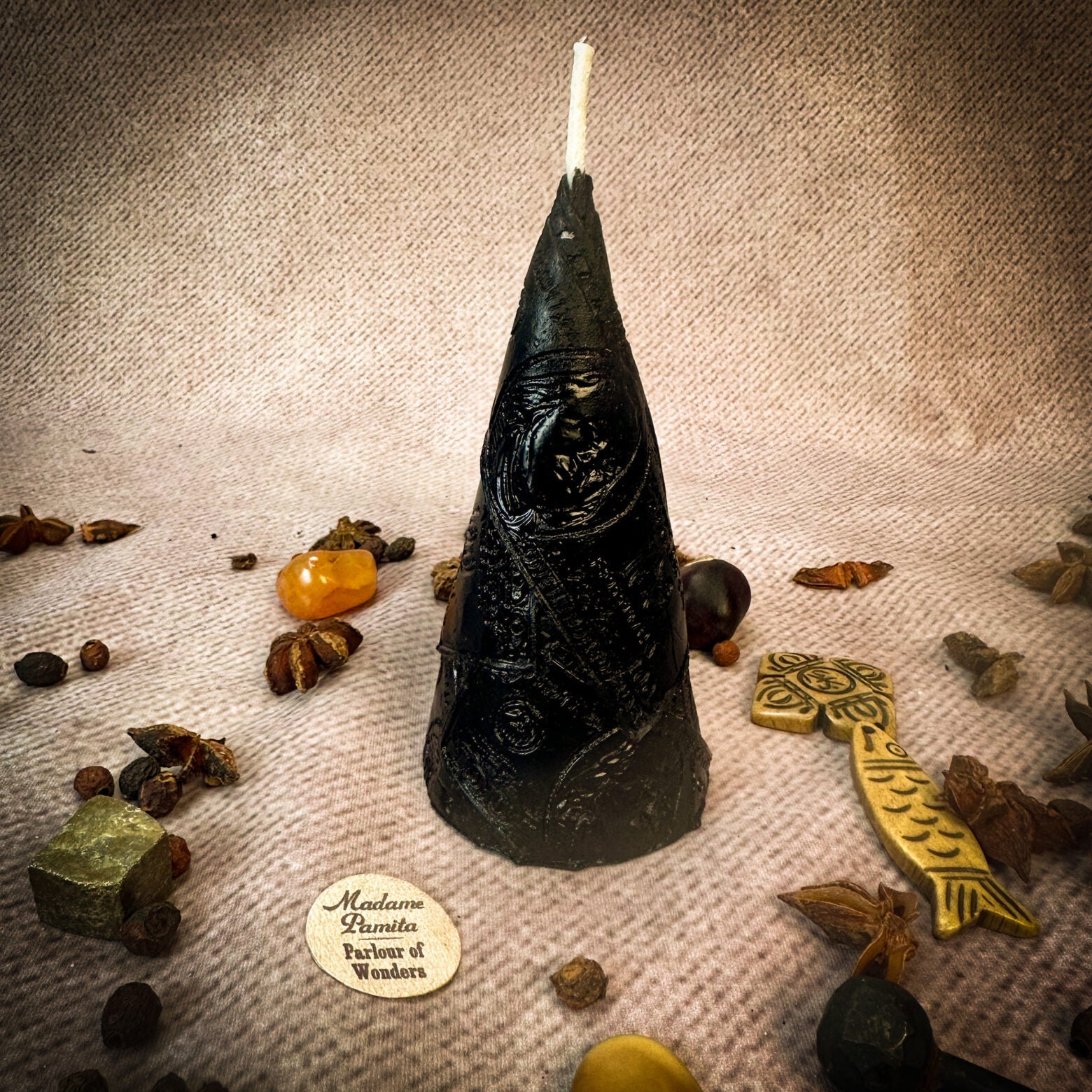 Green beeswax candle by Parlour of Wonders for prosperity and abundance magic, featuring a beeswax Money Maker spell candle.