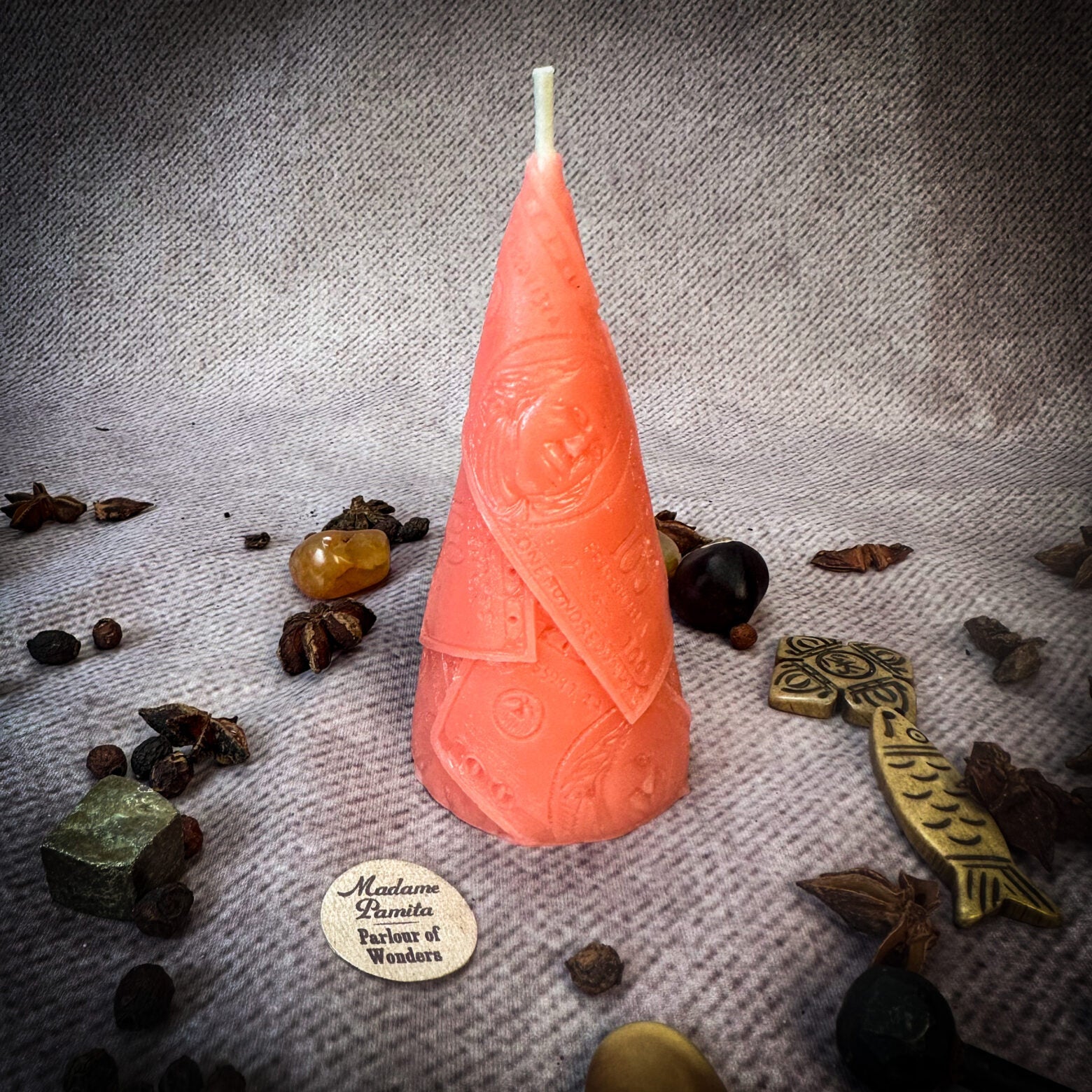 Green beeswax candle by Parlour of Wonders for prosperity and abundance magic, featuring a beeswax money maker spell design.