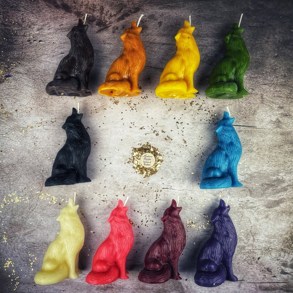 Beeswax Howling Wolf Spell Candle by Parlour of Wonders, orange beeswax candle for courage and authentic voice magic.