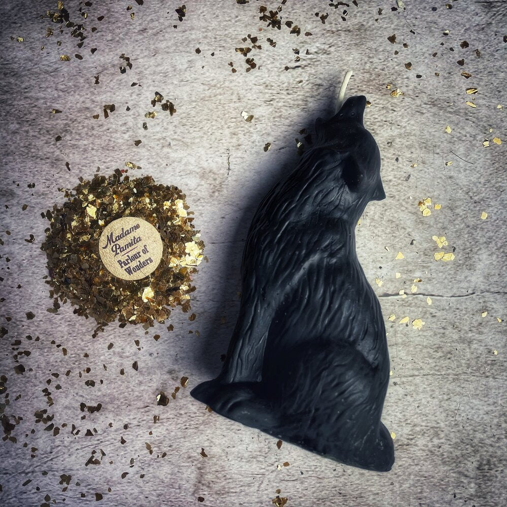 Beeswax Howling Wolf Spell Candle by Parlour of Wonders, orange beeswax candle with wolf design for courage and authentic voice magic.