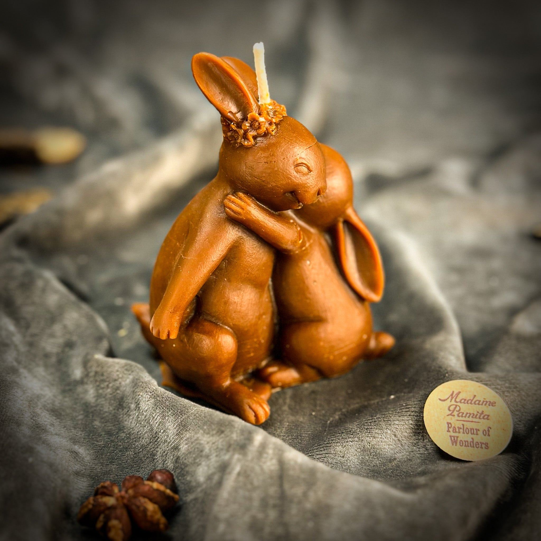 Orange beeswax rabbit spell candle by Parlour of Wonders, symbolizing good luck and new beginnings.