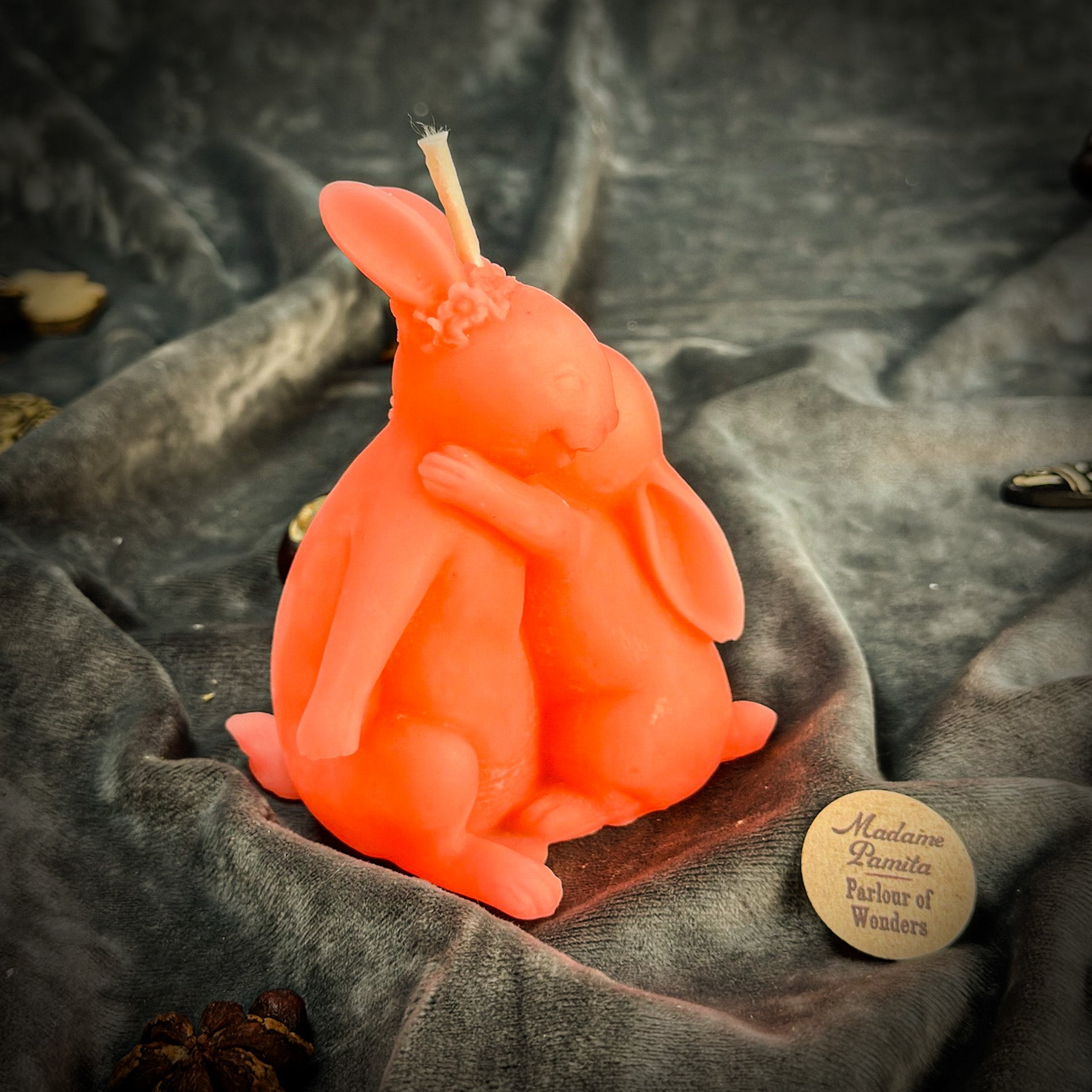 Parlour of Wonders beeswax rabbit spell candle in orange, symbolizing good luck and new beginnings, with detailed rabbit design.