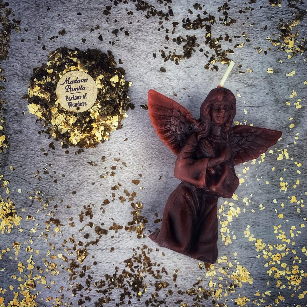 Orange beeswax angel spell candle by Parlour of Wonders, designed for connecting with spirit guides and divine blessings.
