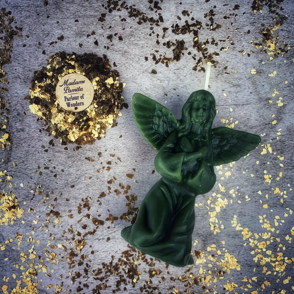 Orange beeswax angel spell candle by Parlour of Wonders for connecting with spirit guides and divine blessings.