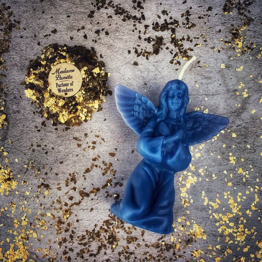 Orange beeswax angel spell candle by Parlour of Wonders, designed for connecting with spirit guides and divine blessings.