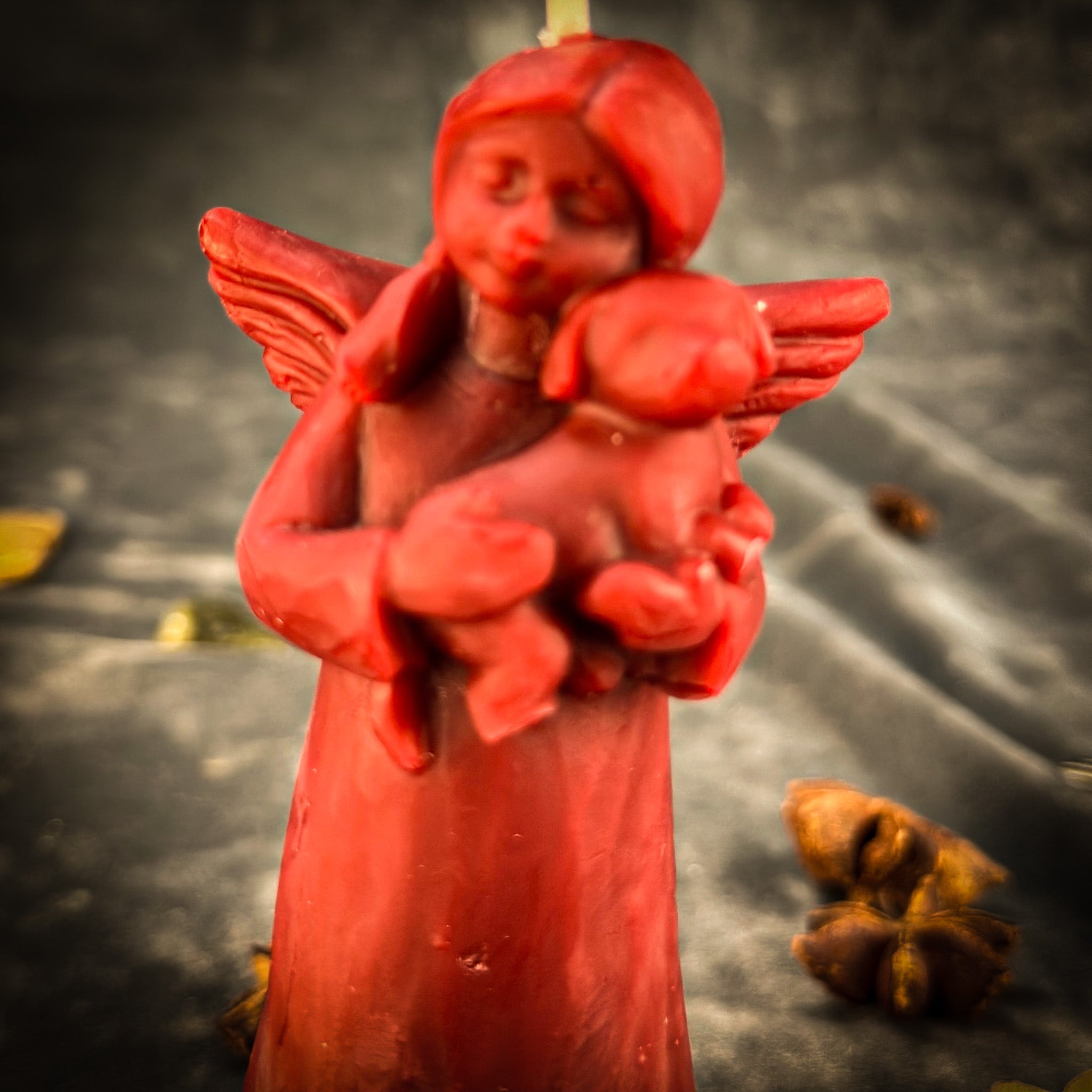 Orange beeswax candle with dog guardian spirit design from Parlour of Wonders, used for pet protection and healing rituals.