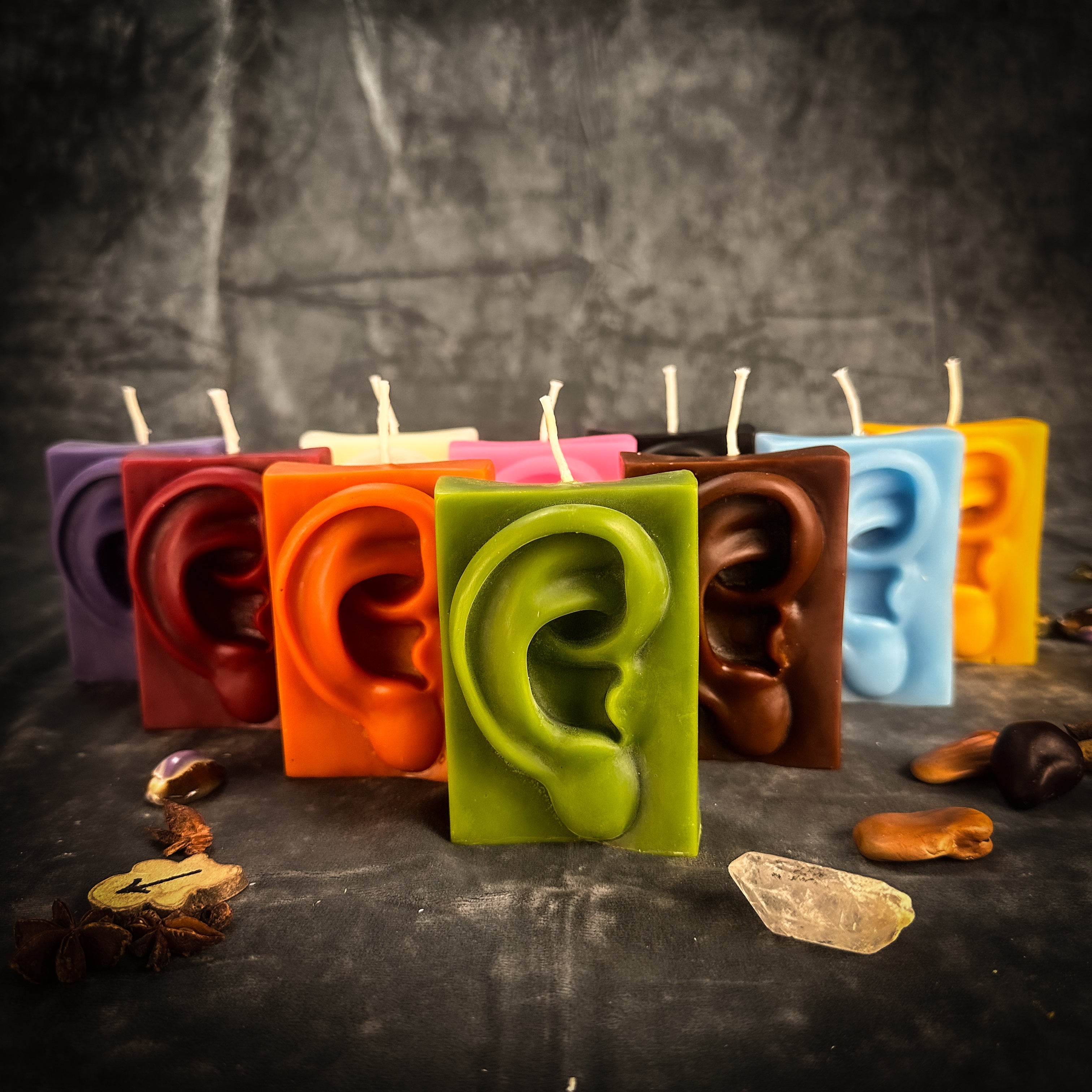 Beeswax Ex-Voto Ear Spell Candle by Parlour of Wonders with orange wax for healing, being heard, and clairaudience.