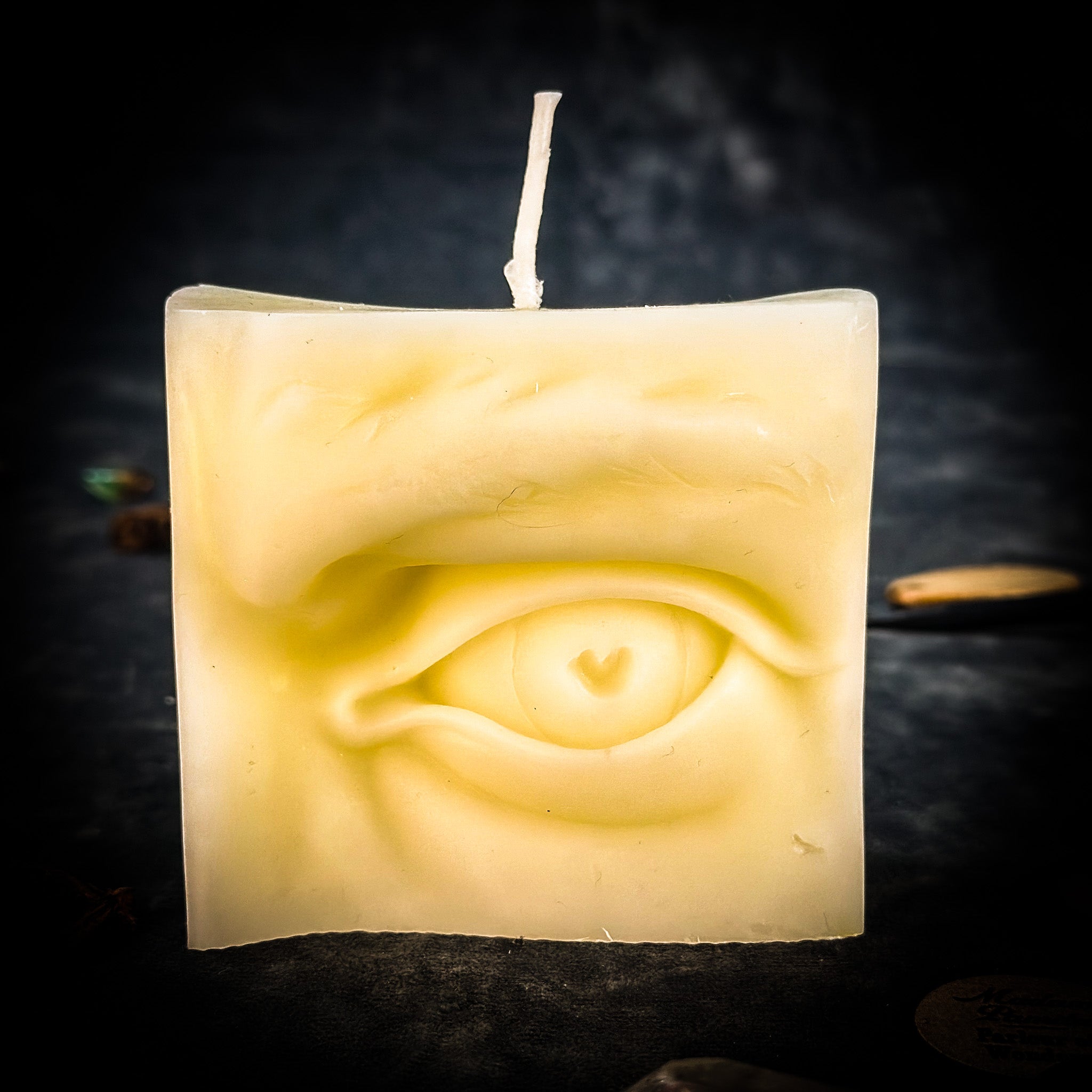 Beeswax Ex-Voto Eye Spell Candle by Parlour of Wonders, orange beeswax candle for vision, clairvoyance, and being seen.