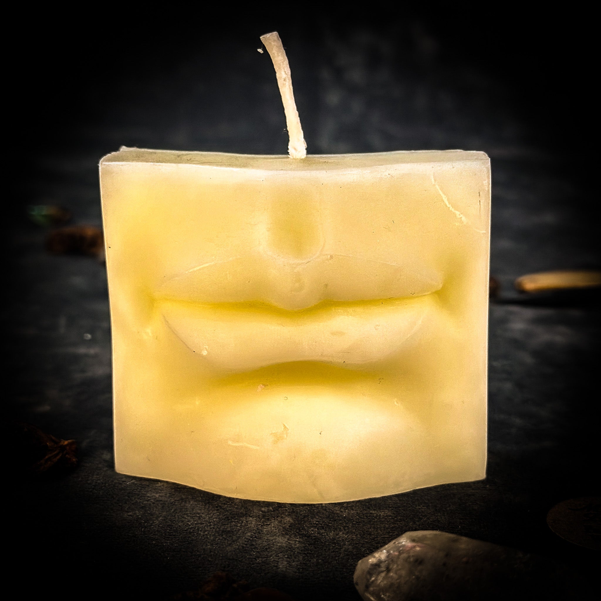 Beeswax Ex-Voto Mouth Spell Candle by Parlour of Wonders, orange beeswax candle for communication, healing, and speaking truth.