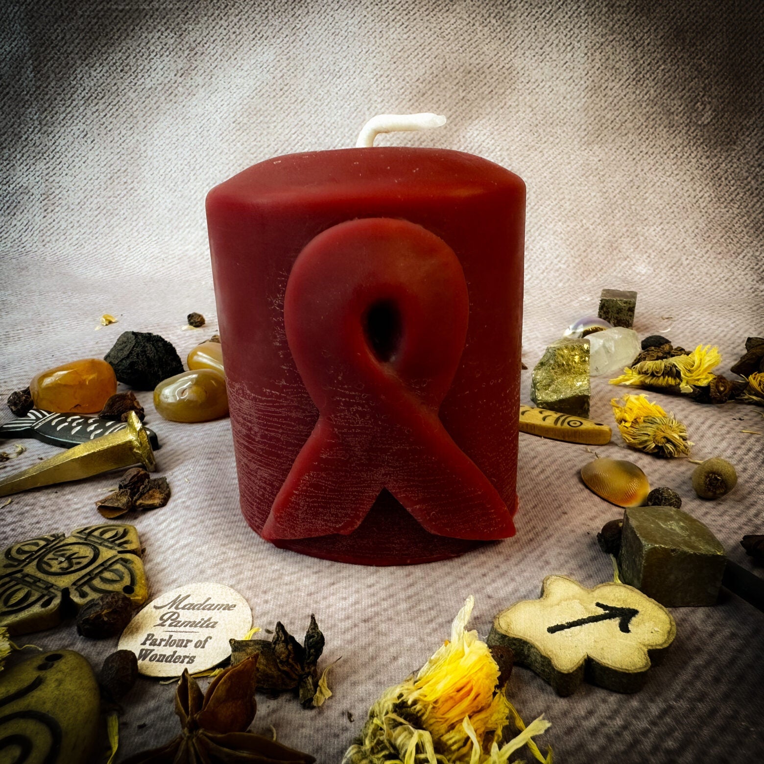 Beeswax ribbon pillar candle by Parlour of Wonders, honoring heroes and supporting causes with a natural beeswax finish.