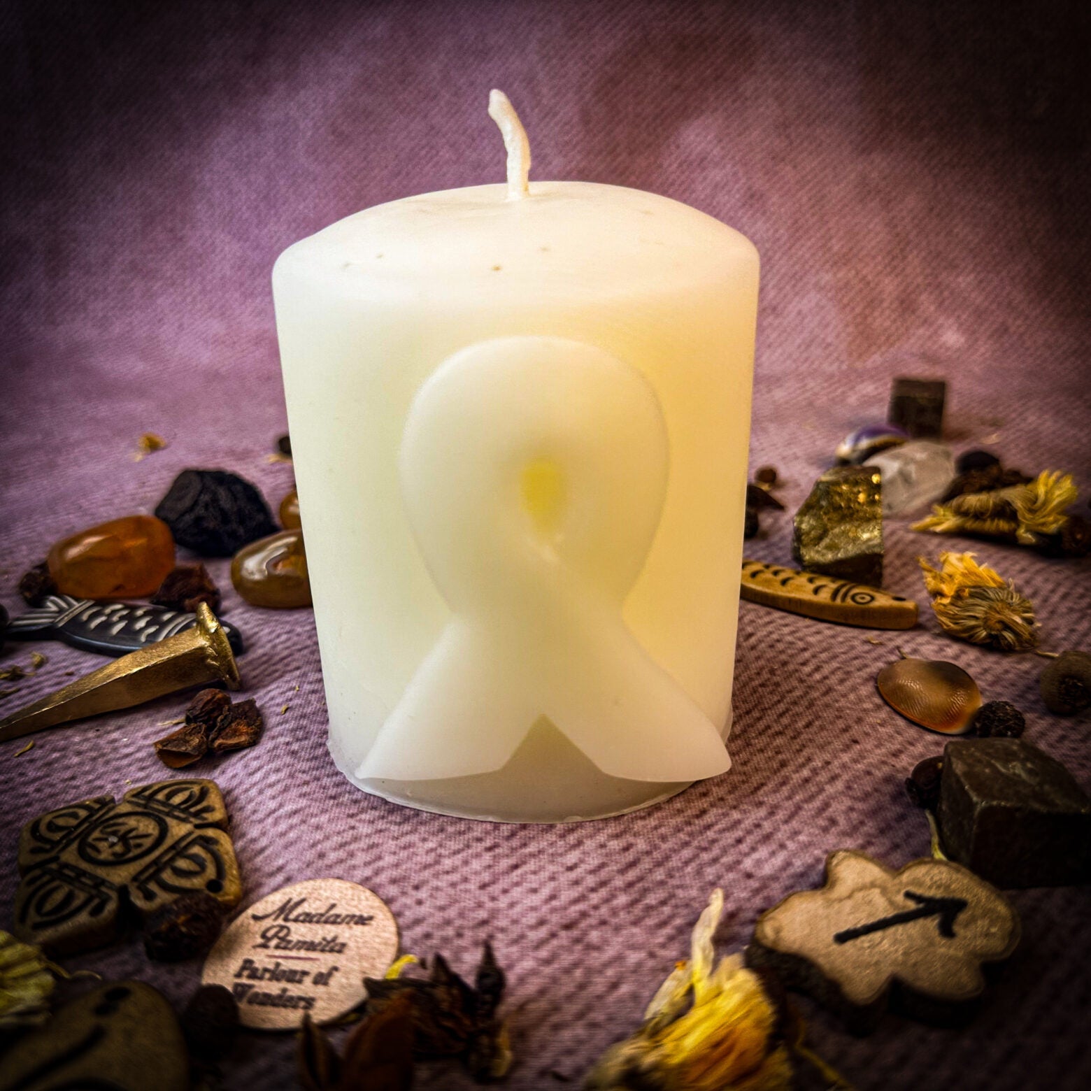 Beeswax awareness ribbon pillar spell candle by Parlour of Wonders for honoring heroes and supporting causes, with a natural beeswax finish.