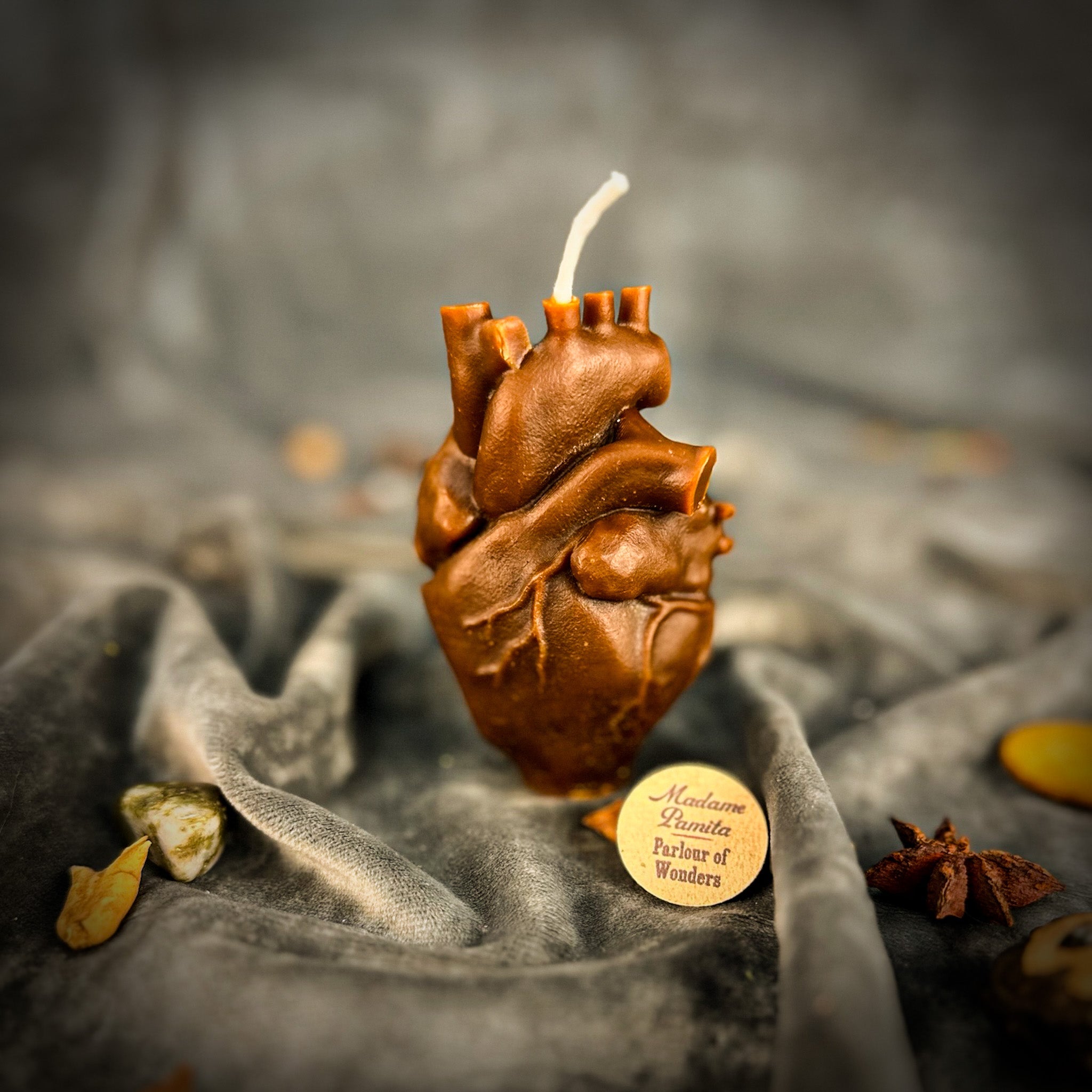 Pink beeswax anatomical heart candle by Parlour of Wonders, designed for love and emotional healing magic.