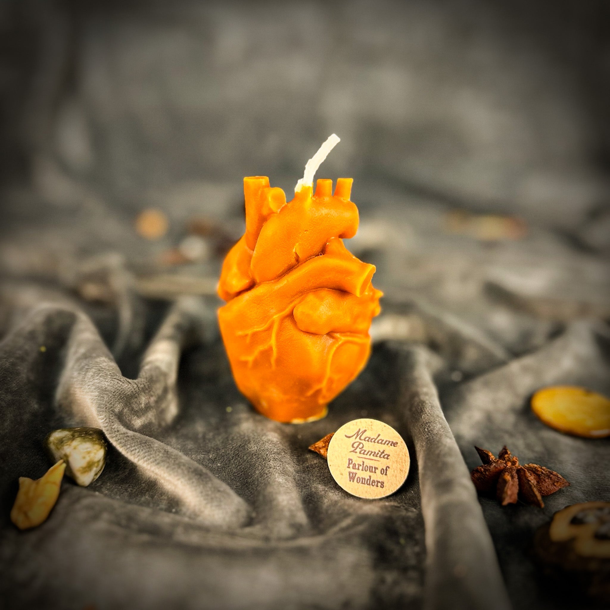 Pink beeswax anatomical heart candle by Parlour of Wonders, designed for love and emotional healing magic.