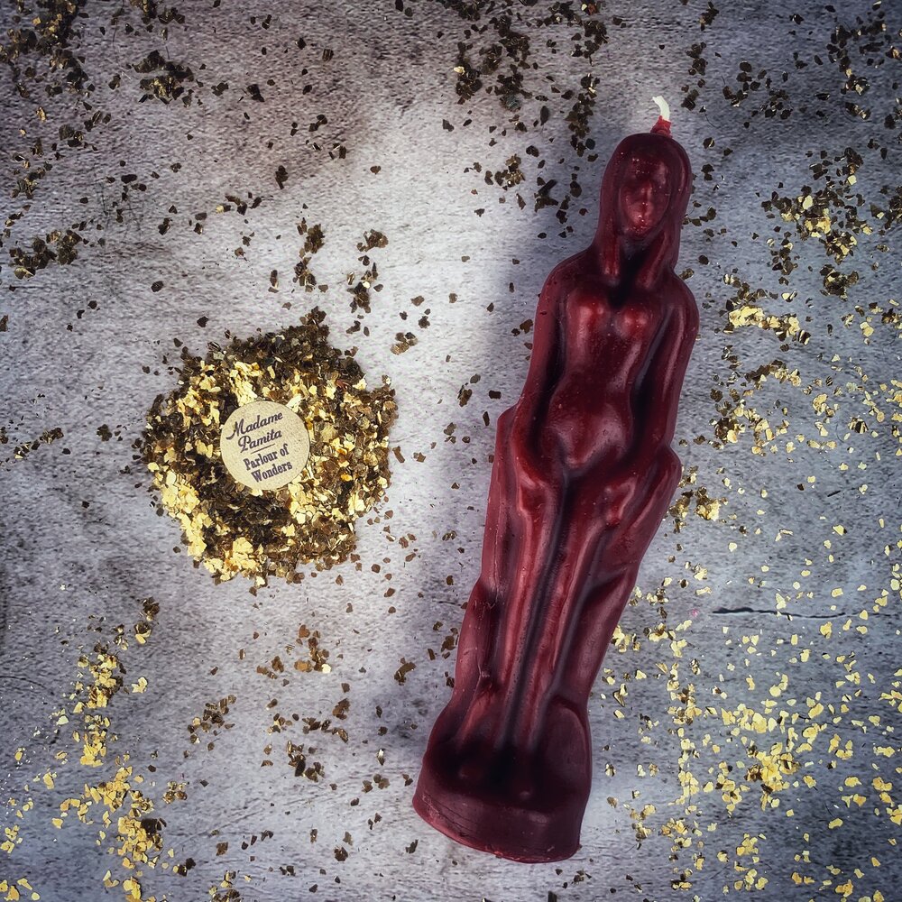 Pink beeswax female figural spell candle from Parlour of Wonders, used for sympathetic magic and personal power rituals.