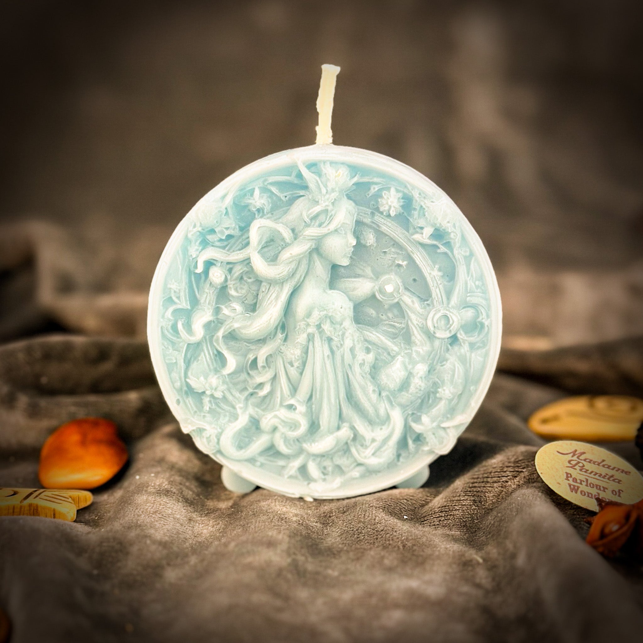 Pink beeswax Libra scales zodiac spell candle by Parlour of Wonders, featuring intricate balance and harmony design.