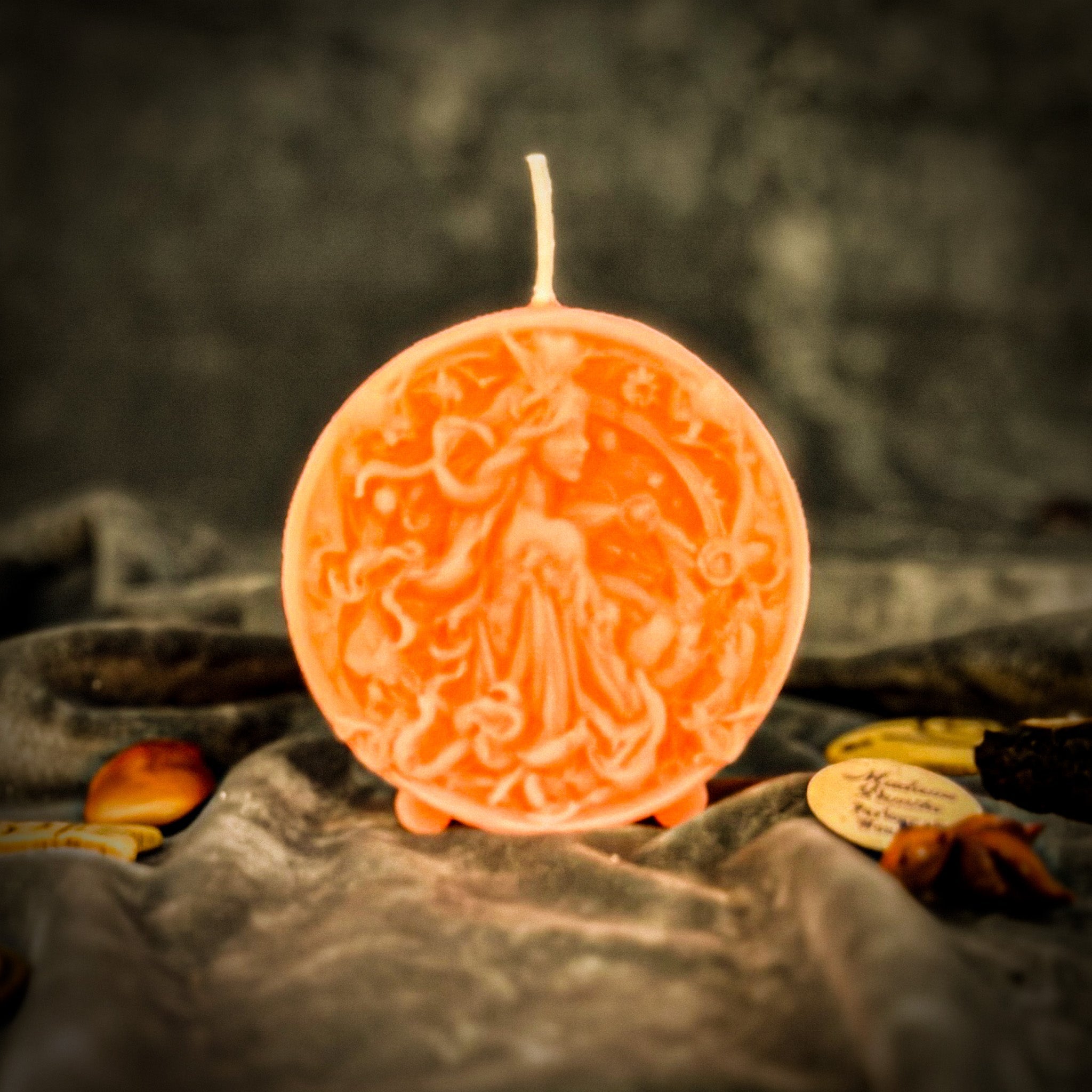 Pink beeswax Libra scales candle by Parlour of Wonders, featuring zodiac symbols for balance, harmony, and love.