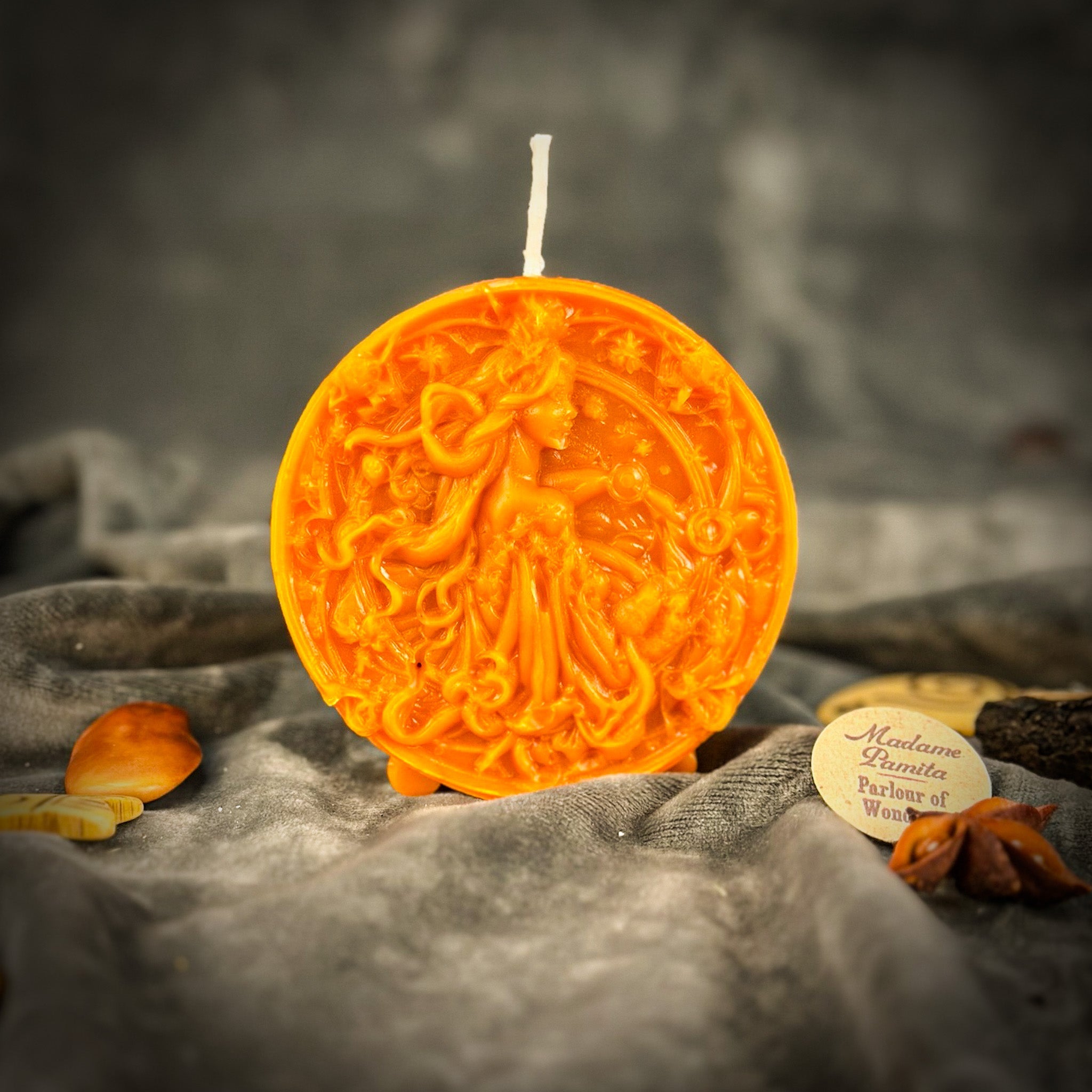 Pink beeswax Libra scales zodiac spell candle with intricate designs, symbolizing balance, harmony, and love.