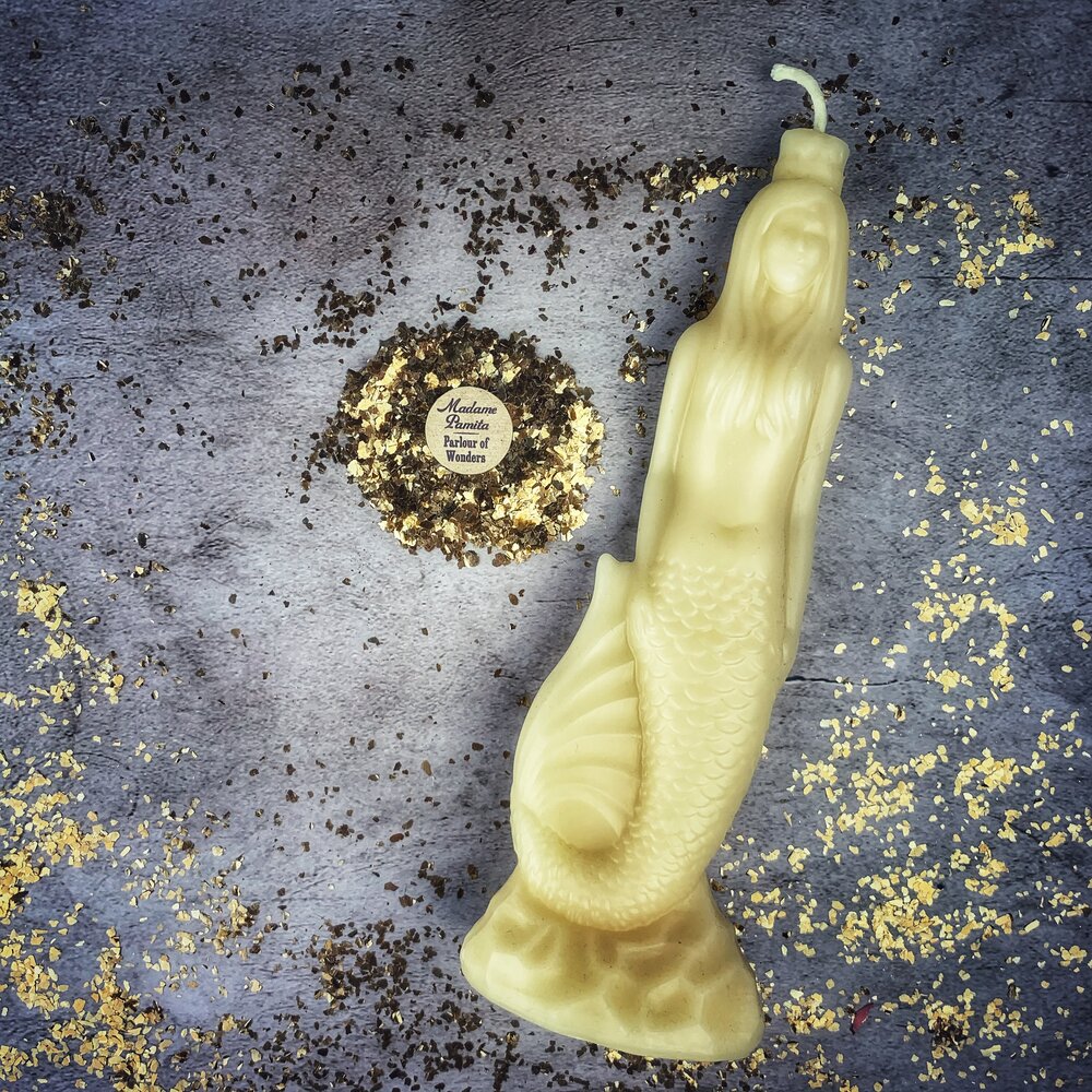 Pink beeswax Mermaid Magic Spell Candle by Parlour of Wonders, featuring love, beauty, and water goddess magic themes.