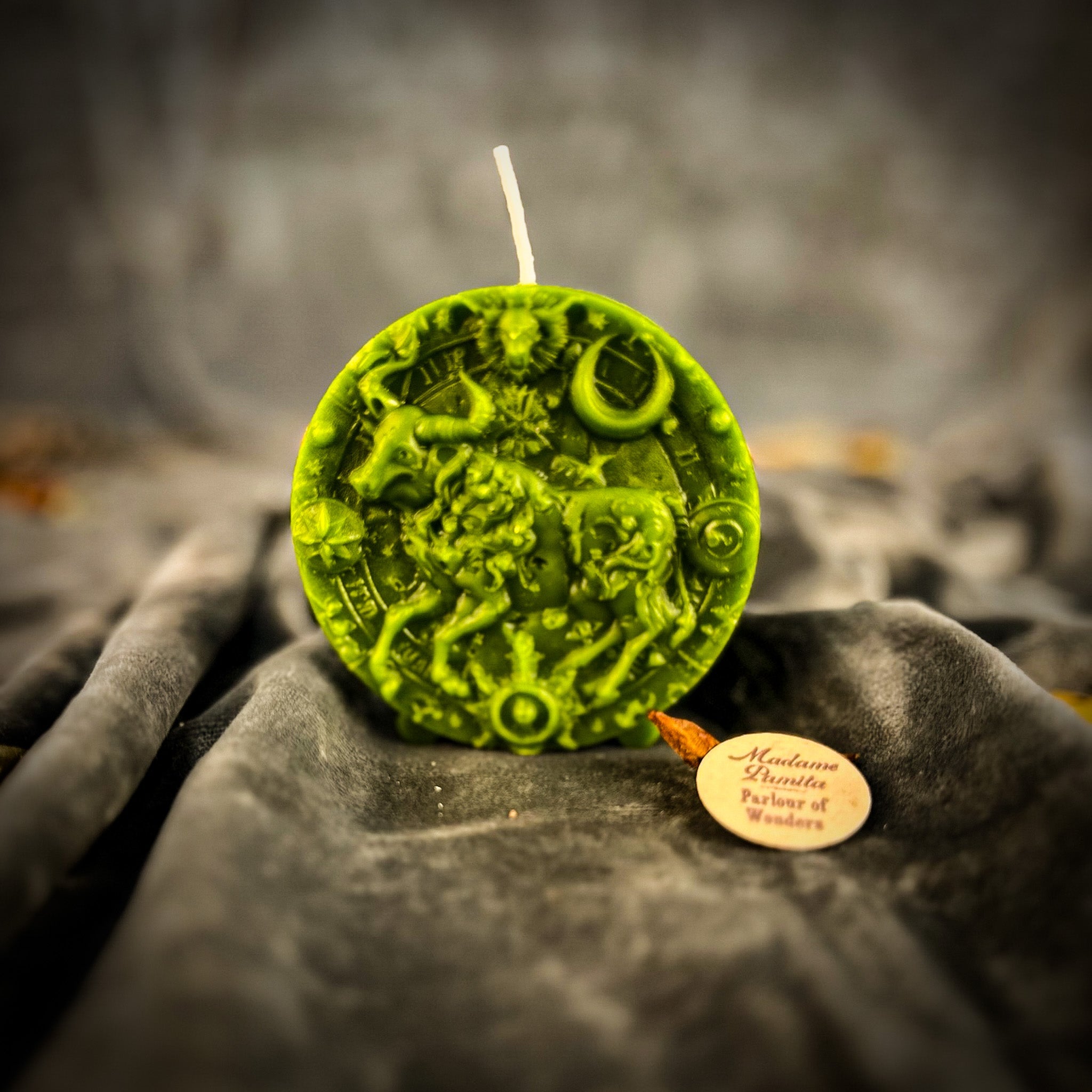 Pink beeswax Taurus Bull zodiac spell candle by Parlour of Wonders, symbolizing abundance, stability, and sensuality.