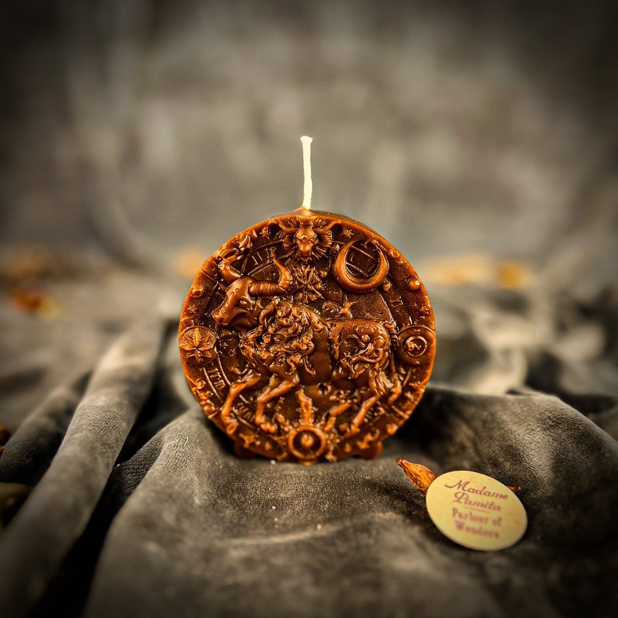 Pink beeswax Taurus Bull zodiac spell candle from Parlour of Wonders, symbolizing abundance, stability, and sensuality.