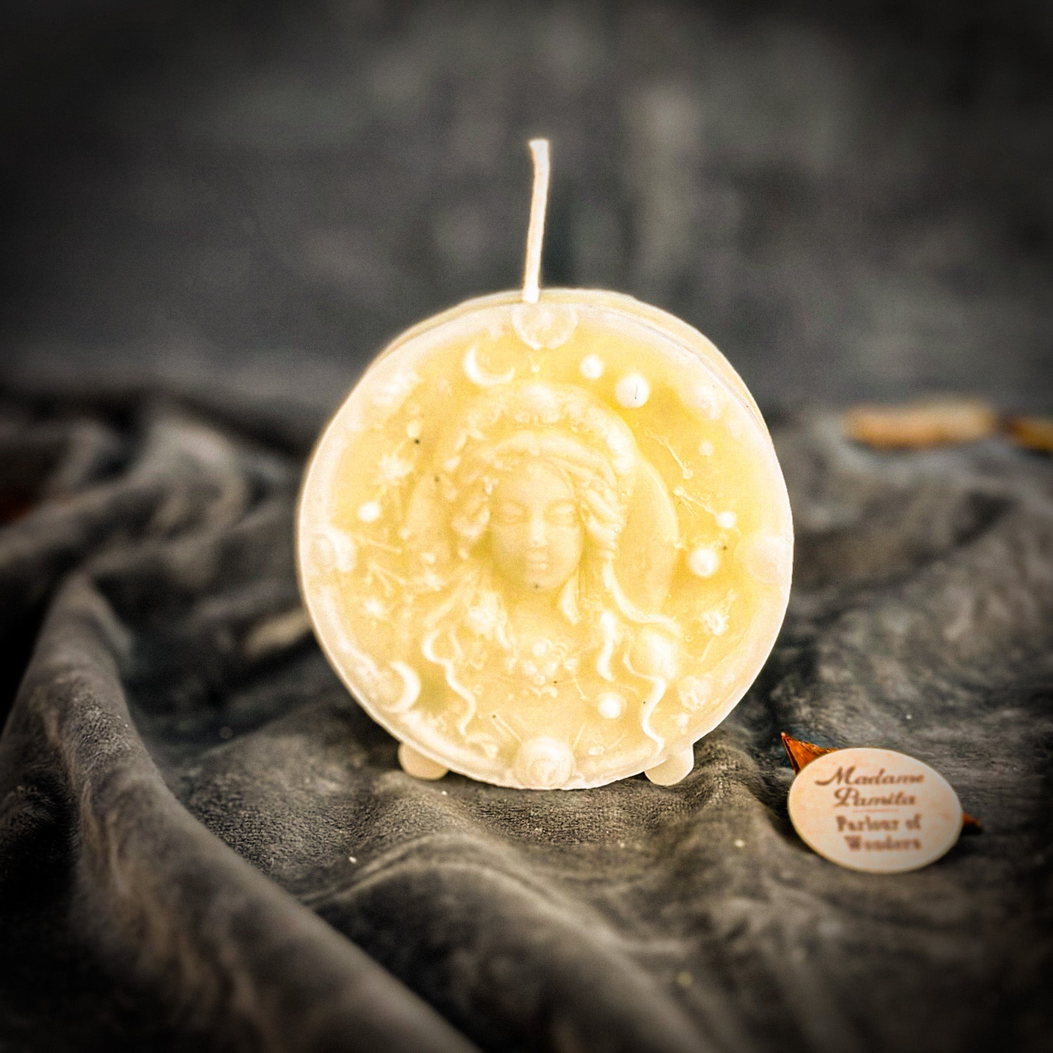 Pink beeswax Virgo Maiden zodiac spell candle by Parlour of Wonders, featuring intricate design for focus, healing, and practicality.