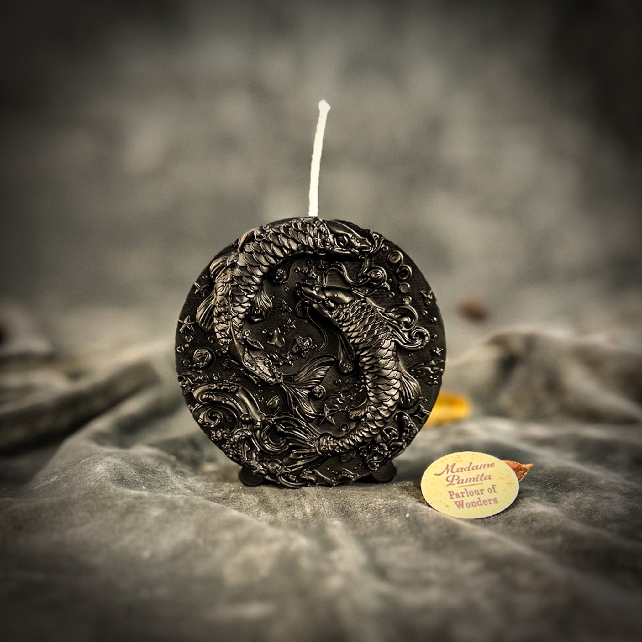 Purple beeswax Pisces fish zodiac spell candle by Parlour of Wonders, featuring a Pisces fish design for intuition, compassion, and dreams.