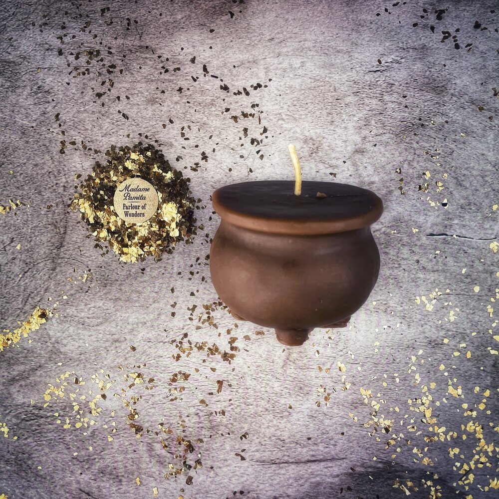 Red beeswax cauldron of magick spell candle by Parlour of Wonders for transformation and positive change magic.