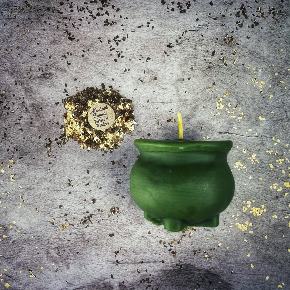 Red beeswax cauldron of magick spell candle by Parlour of Wonders for transformation and positive change magic.