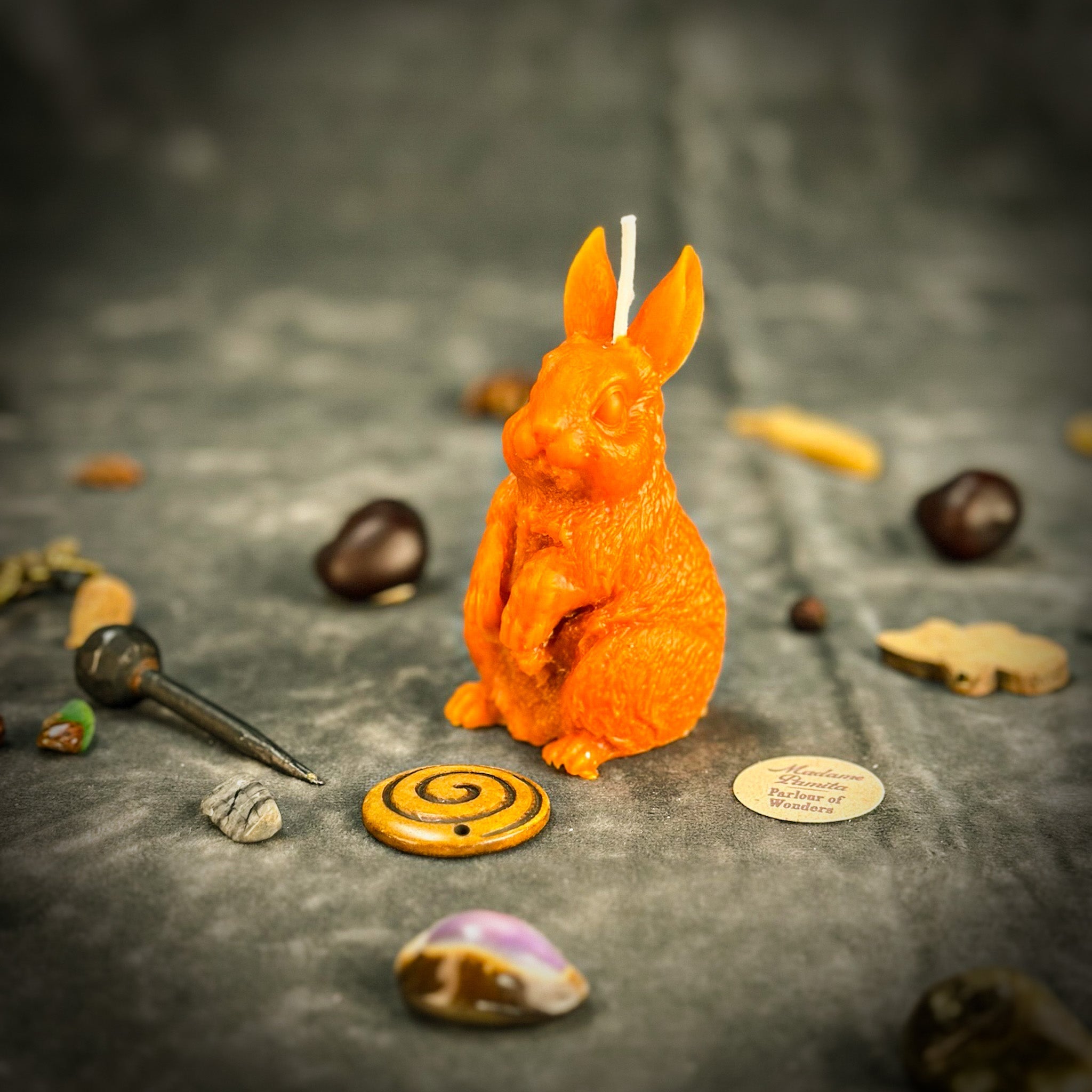 Red beeswax Enchanted Bunny Spell Candle by Parlour of Wonders for abundance, fertility, and quick thinking.