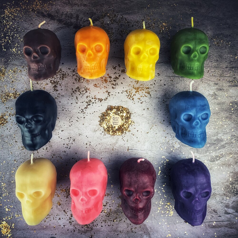Large red beeswax skull candle from Parlour of Wonders, featuring detailed design ideal for mind influence and ancestral wisdom magic.