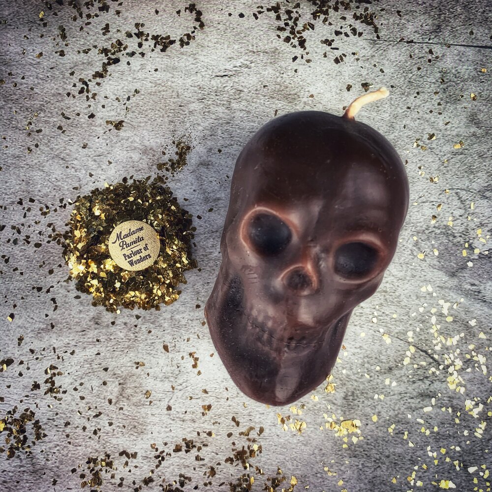 Large red beeswax skull spell candle from Parlour of Wonders, featuring intricate details for mind influence and ancestral wisdom magic.