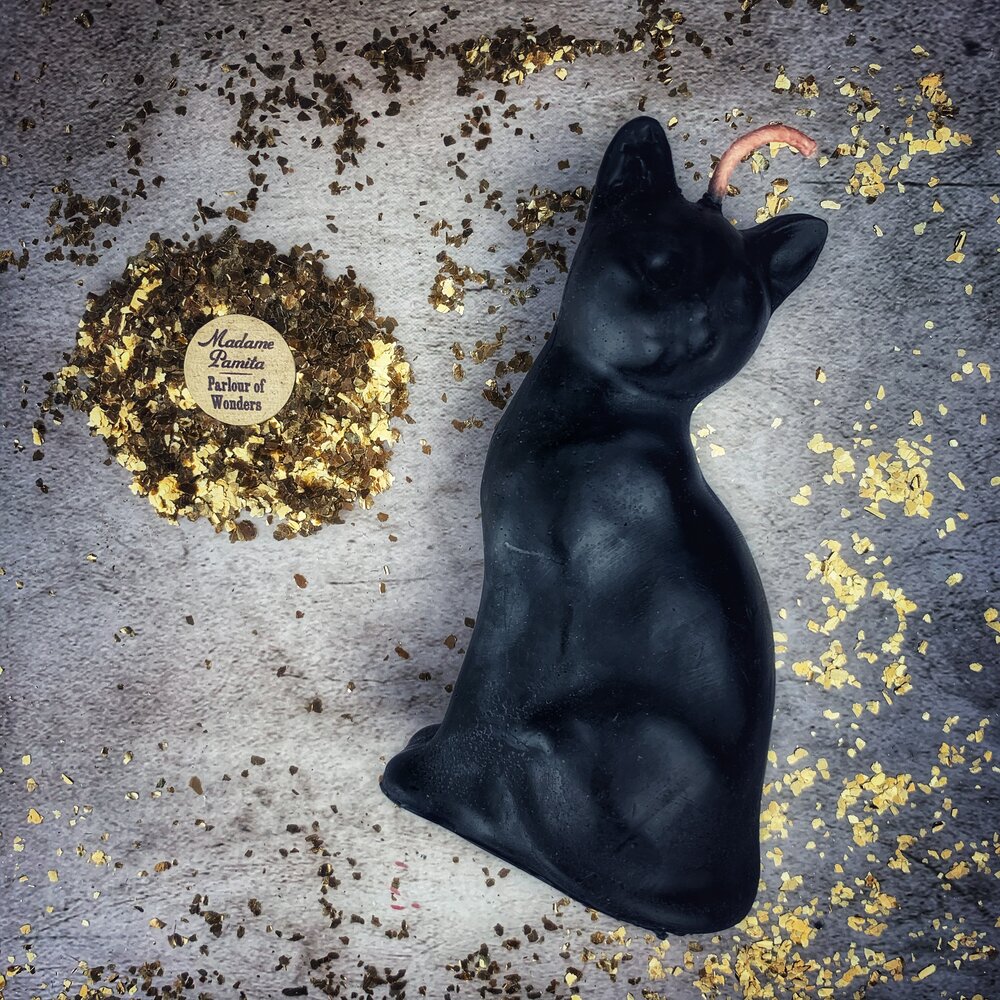 Red beeswax lucky cat spell candle by Parlour of Wonders, designed for fast action and manifestation magic.