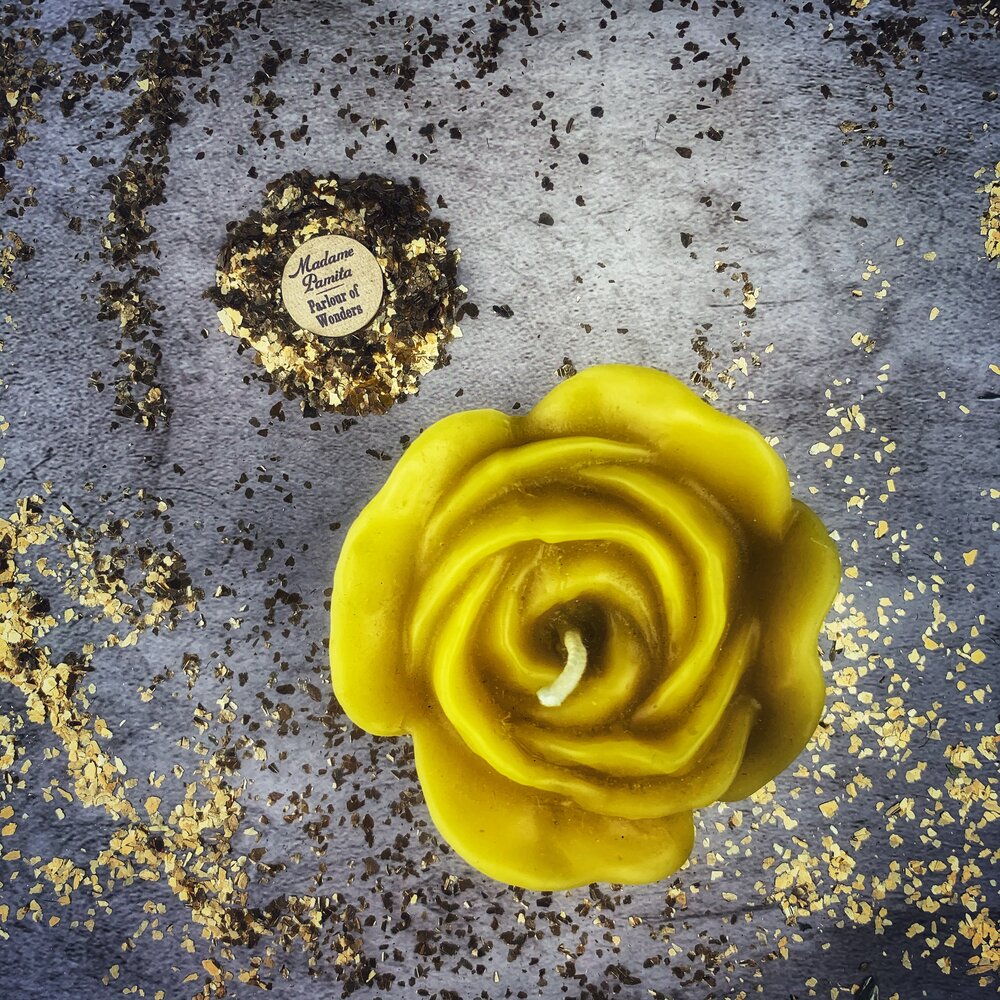 Beeswax Rose Romance Spell Candle by Parlour of Wonders featuring a red beeswax candle with rose design for love and soulmate magic.