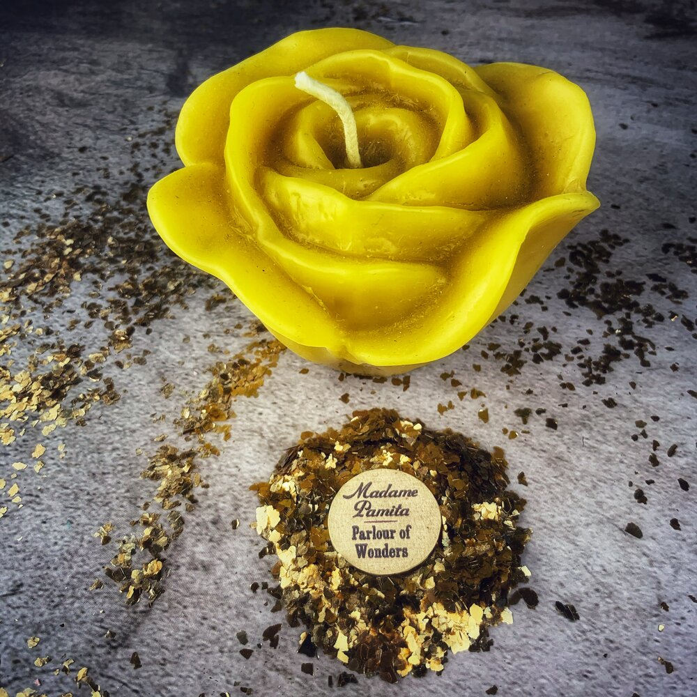 Beeswax Rose Romance Spell Candle by Parlour of Wonders featuring a red beeswax candle with rose design for love magic and soul mate attraction.