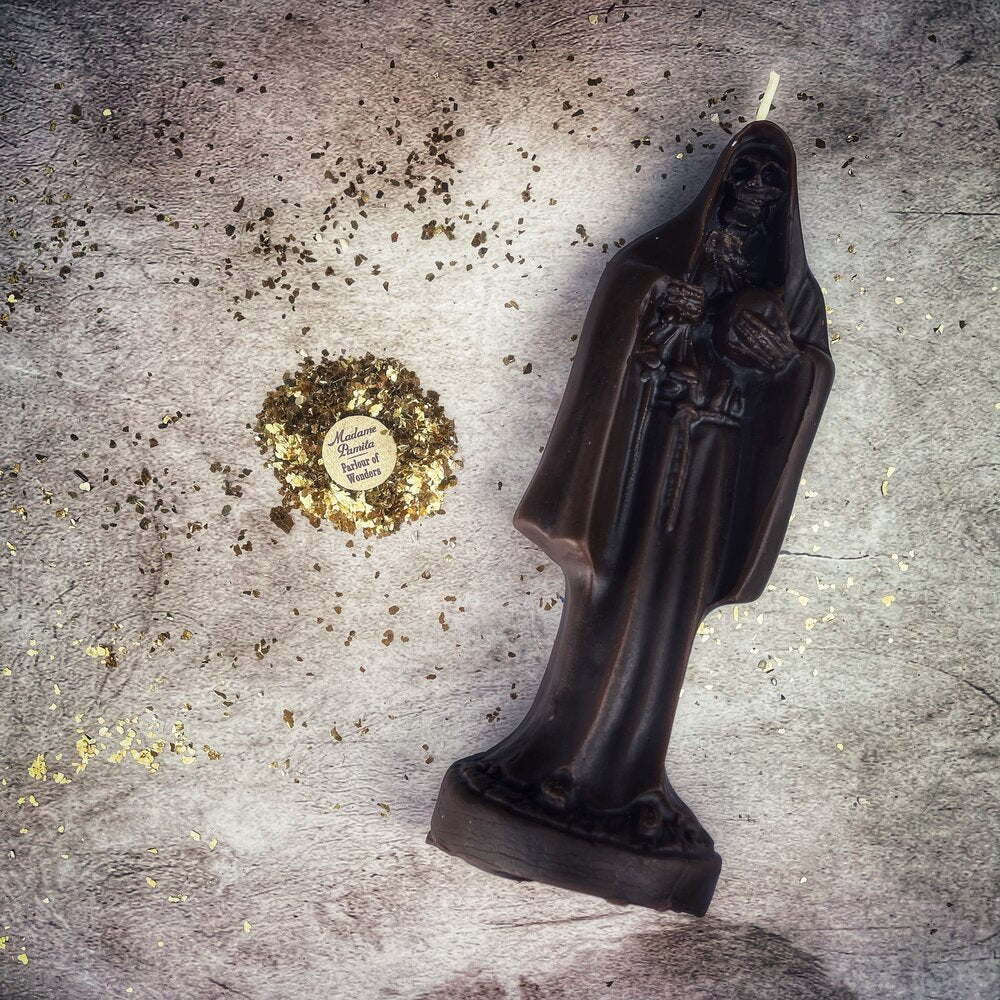Red beeswax Santa Muerte spell candle from Parlour of Wonders for devotion, protection, and folk magic rituals.